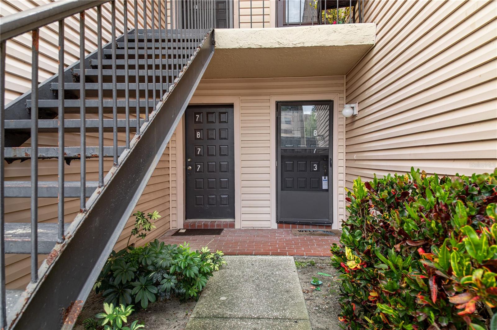 Opportunity awaits in this spacious 2-bedroom, 2-bathroom first-floor condo located in the gated River Oaks community of Tampa. Recent updates include a 2022 water heater and air ducts professionally cleaned in 2026. While the unit could use some TLC, it presents an excellent opportunity to customize and add value. Offering nearly 1,200 square feet of living space, this home features a functional layout with wood-look luxury vinyl flooring throughout the living room and both bedrooms, while the kitchen and dining area are finished with tile flooring. The spacious kitchen offers abundant cabinet storage and opens to the dining area, with sliding glass doors leading to a private patio complete with an exterior storage closet. The primary bedroom includes a walk-in closet and an ensuite bathroom with a stand-up shower, while the guest bathroom features a convenient tub/shower combination. Residents enjoy access to two community pools, assigned parking, ample guest parking, and private access to the Hillsborough River. Conveniently located just minutes from the University of South Florida, Busch Gardens, shopping centers, restaurants, entertainment, and major roadways, this condo offers incredible potential in a desirable Tampa location. Schedule your showing today!