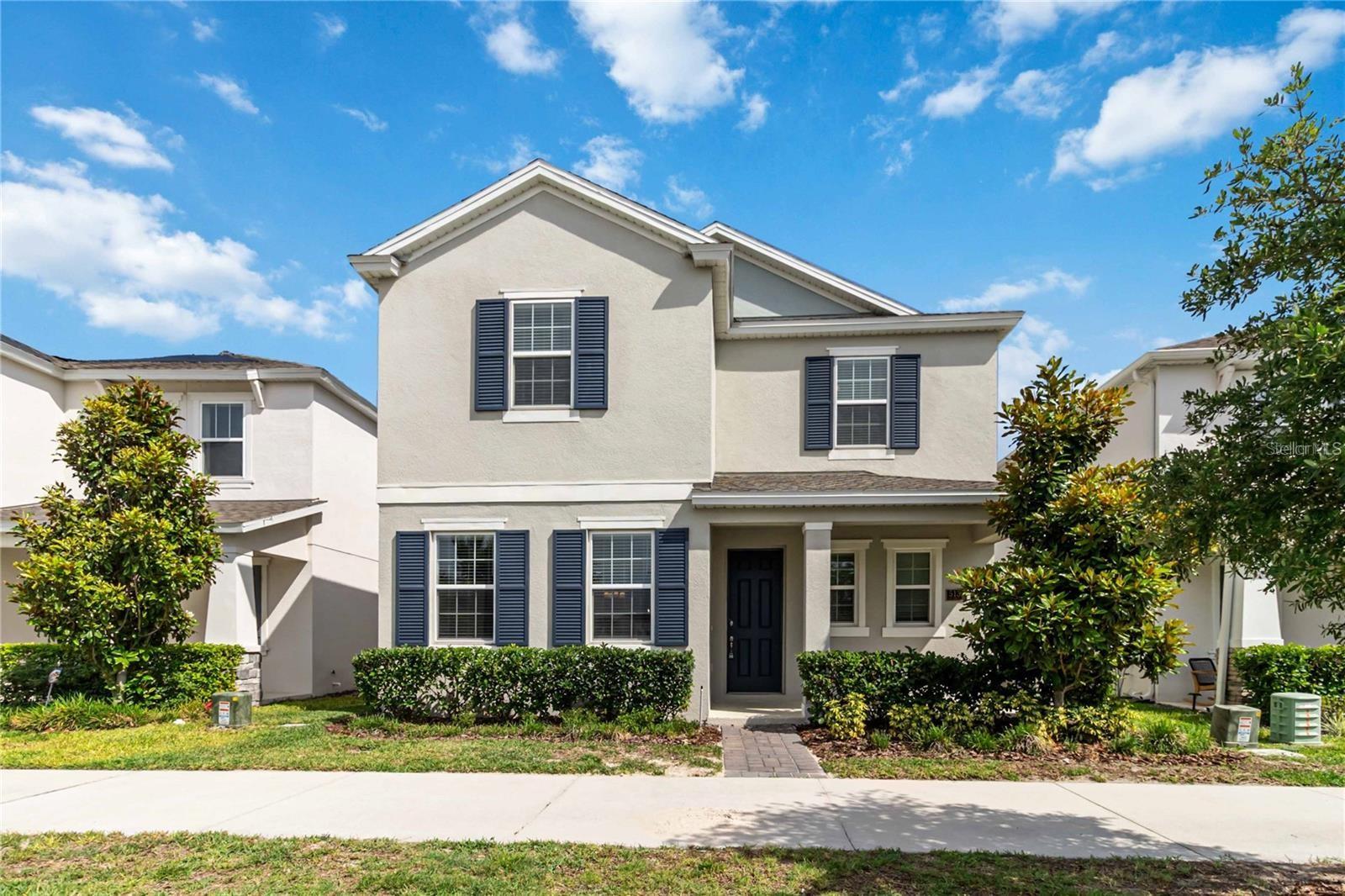 Beautiful, Water view home, Davis model, Awesome location in the heart of Horizon West right off the 429 at Independence and Avalon. This 4-2.5 with 2802sf sits right across the street from large pond so you can enjoy sitting on your front porch and take in the scenery. Inside has nice remodeled upgrades and ceiling fans through out. An open floor plan, great room and dining look into the gourmet kitchen, with built in oven, built in cooktop and stove hood. Sink island with breakfast bar. Beautiful tiled back splash, crown molding with white granite counters on white cabinets. First floor master bedroom, large walk-in closet, dual sinks, separate toilet, separate shower and stand alone tub. Second floor has bedrooms 2, 3, and 4 each have walk in closets. Laundry room upstairs with washer and dryer and hall bath. Front large loft through door is 14x20. Off the kitchen is back door to back covered porch and covered walk to garage. This home has 2 ac units for more efficiency, and fiber optic cable and lawn care is included. This community is right near the 429 exit at Independence, near the hospital and tons of new shops and restaurants. Information is deemed reliable but not guaranteed. pictures have virtual furnishings