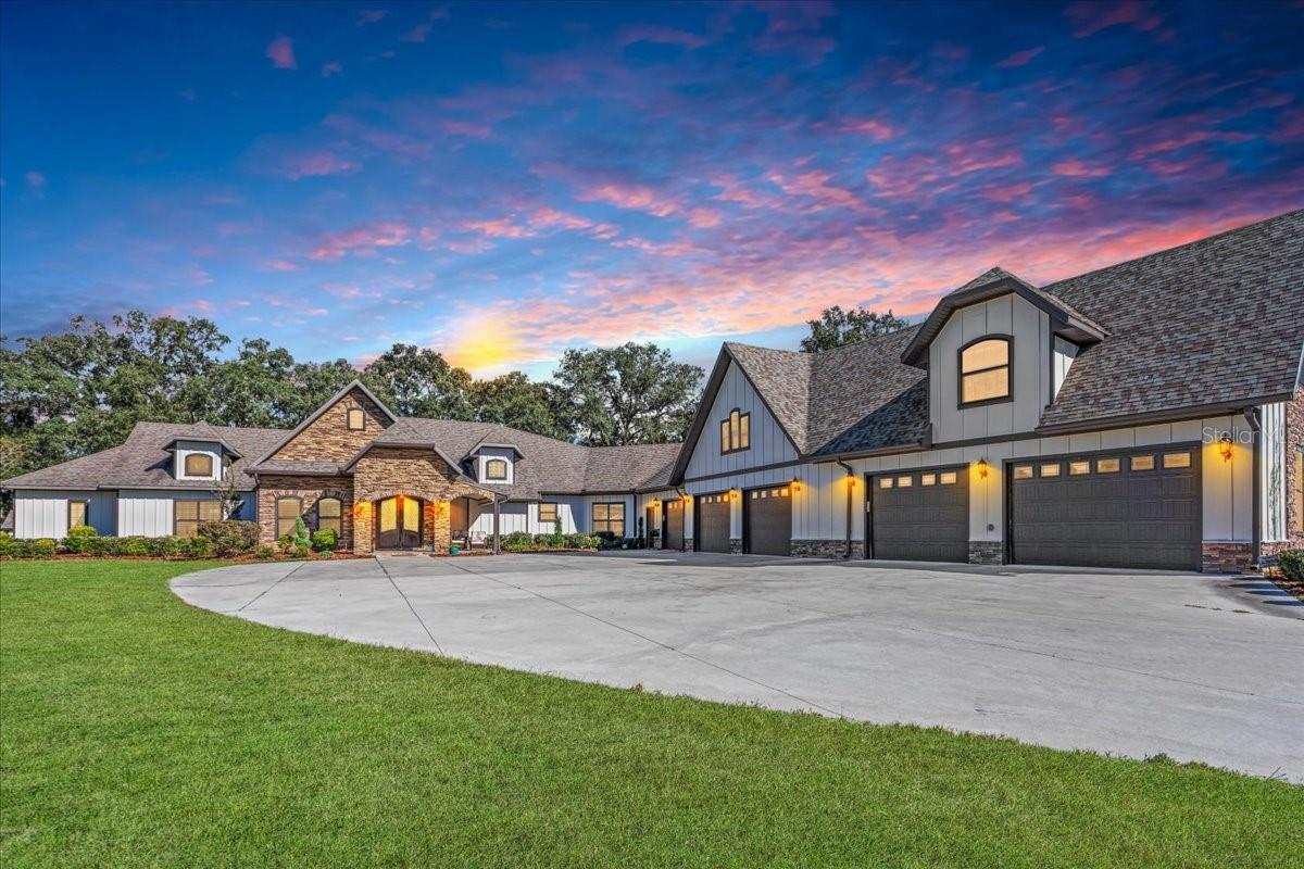 Seller motivated to sell, hugh price reduction. One of the finest estate properties you will ever see! Just approximately 2.5 miles south of the stoplight on SR 45 in Newberry. Well laid out 65.9 acres within the city limits. The owner is a long time builder who built this incredible home. Stunning pasture offers a picturesque view from the rear of the home which has a recent swimming pool with custom pavers. Upon entering you will find an open living area like few you will ever encounter. The home has an ideal atmosphere with comfort for relaxing and entertaining guests and large parties. You will find a specious kitchen with top-of the line appliances, gorgeous cherry cabinets, and granite countertops. This is a kitchen that any chef or cooking enthusiast would appreciate! Beautiful hickory wood flooring adds ambiance. The home features 4 spacious bedrooms and 4.5 luxurious bathrooms. The large master bedroom suite features a bath with a soaking tub and a custom travertine shower, and one of the largest well laid out walk-in closets you might ever encounter! Huge oversized attached 5 car garage more than allows space for vehicles, tools and more.  The pristine pasture areas provide for horses, cattle, and could be ideal for growing hay, vegetables or possibly future development? Also featured is a 6,000 SF barn for storing hay or equipment. There is a 3 exterior stall. Gainesville, Shands HCA  and other medical facilities are a fairly quick drive. Also close is the well known University of Florida, which is one of the largest and most respected colleges in the entire United States. This is an exceptional country estate on 65.9 acres with ample paved road frontage and a long winding driveway to the home. This property is truly a rare find to make a living adventure.. Contact us today to arrange a private viewing.
