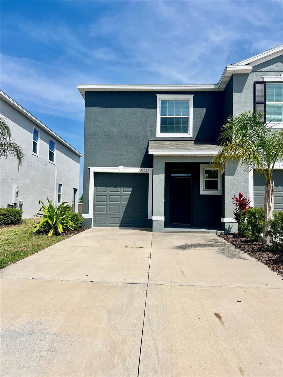 Welcome home to this beautiful 3-bedroom, 2.5-bath townhome with an attached garage, located in a highly desirable lagoon community. Designed with comfort and convenience in mind, this spacious home features an open-concept floor plan that seamlessly connects the living, dining, and kitchen areas—perfect for both everyday living and entertaining. The modern kitchen offers ample cabinet and counter space, making meal preparation a breeze, while the generous primary suite includes a private en-suite bath and a large walk-in closet. Two additional bedrooms provide flexibility for family, guests, or a home office, and the convenient half bath on the main floor is ideal for visitors. Enjoy low-maintenance living with access to the community's incredible resort-style lagoon, where residents can relax on sandy beaches, swim in crystal-clear waters, kayak, paddleboard, or simply soak up the Florida sunshine. Additional community amenities may include walking trails, parks, and recreational areas. Conveniently located near shopping, dining, entertainment, and major highways, this townhome offers the perfect combination of modern living and resort-style amenities. Don't miss your opportunity to make this exceptional home your next rental!