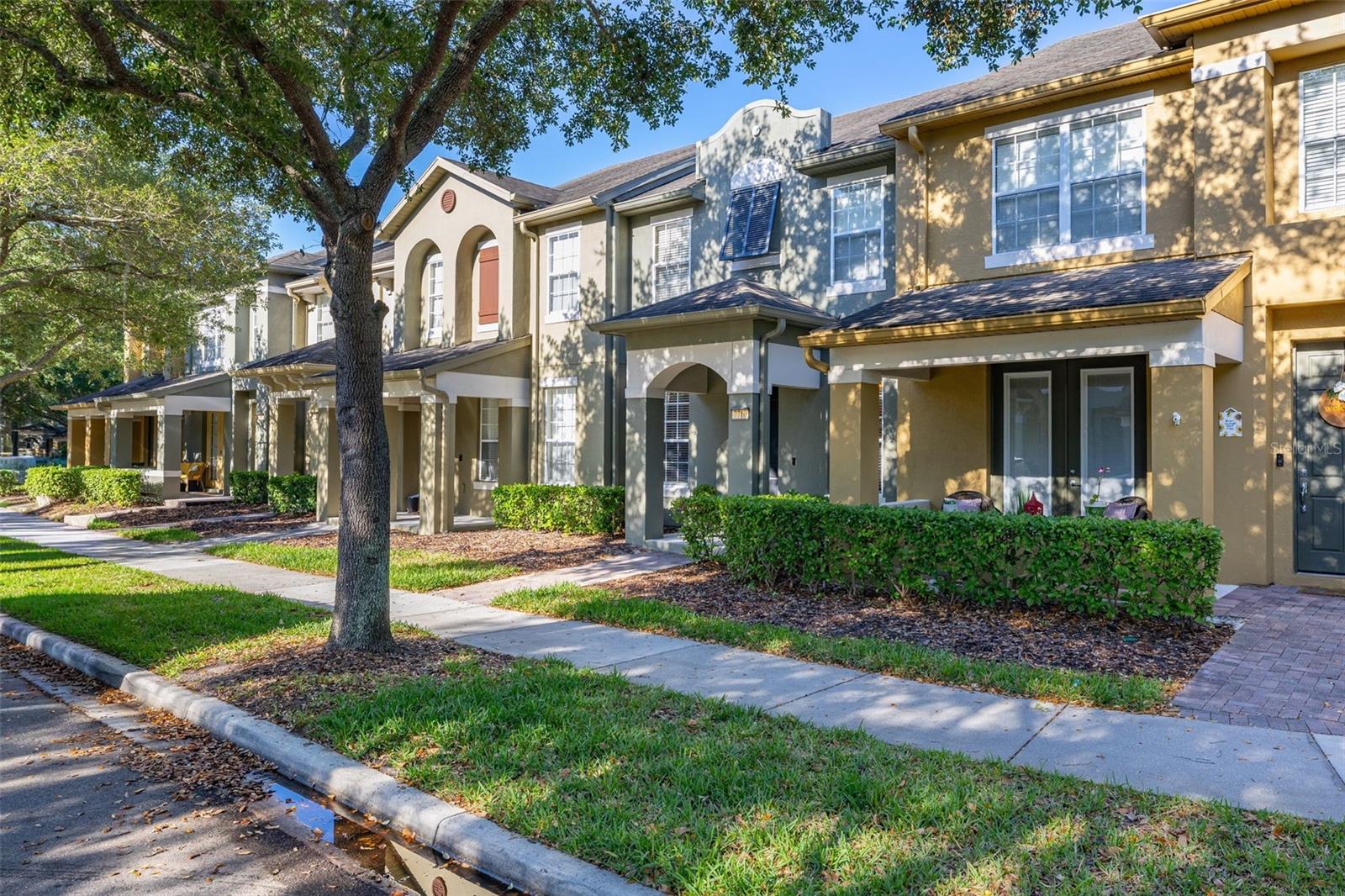 PRICE ADJUSTMENT!! Don’t miss this fantastic opportunity to own a spacious townhouse in the highly desirable Lake Sawyer South community of Windermere, Florida. Nestled among tree-lined streets, this 3-bedroom, 2.5-bath home with a 2-car garage offers comfort, style and tranquility. As you enter, a spacious living room welcomes you - perfect for entertaining. The kitchen boasts granite countertops, stainless steel appliances, and a walk-in pantry, with French doors leading to a large, paved courtyard that connects to the detached 2-car garage. A conveniently located laundry room completes the downstairs layout. Upstairs, the expansive primary suite features an en suite bath with dual vanity, while two additional bedrooms share a full hall bath with a shower/tub combo. Residents of this well-maintained community enjoy multiple parks, trails, playgrounds, tennis and basketball courts, and a refreshing swimming pool. The HOA covers lawn care, exterior painting, and the roof—adding convenience and peace of mind. Known for its top-rated schools and quality of life, Windermere offers proximity to Disney World, theme parks, major roadways, fine dining, and shopping. Start enjoying everything this exceptional home and community have to offer.