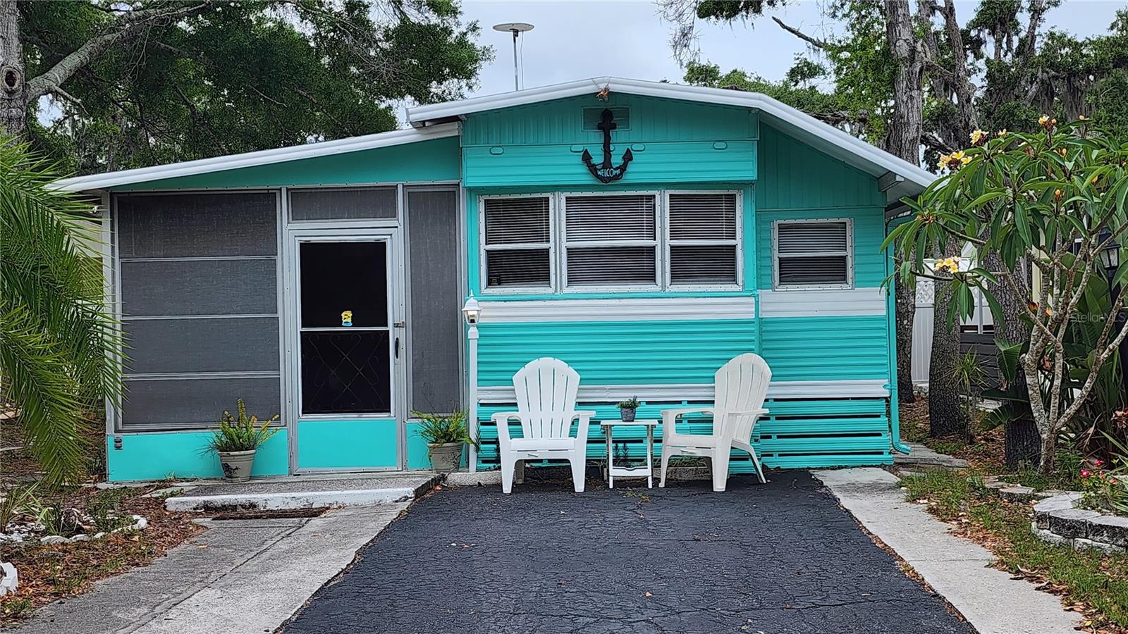CHARMING FLORIDA GETAWAY PROPERTY! This furnished property is ready for you to start enjoying your vacation home! The lovely enclosed lanai is the perfect place to entertain friends or just relax. The cozy interior has one bed, one bath, kitchen and sitting area. There is also an outdoor patio and storage shed. Updated plumbing and newer water heater. Coin laundry is available directly behind home. Sugar Creek Resort in Bradenton, FL features a heated pool, mini golf, club house, tennis & pickleball, workshop, shuffleboard, and an active social calendar during the winter season. Low HOA fees of $500 per quarter include grass mowing, water, sewer, and trash. Enjoy this community's proximity to the Braden River and River Links Golf Course. This home is sold for CASH ONLY in as-is condition. Sorry this is not a dog lot.