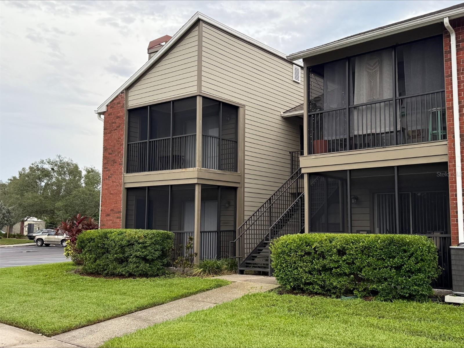 FIRST FLOOR, CORNER UNIT, PRICED TO SELL!!! Welcome to The Enclave, a gated, pet-friendly community offering comfort, convenience, and low-maintenance living in St. Petersburg! This 1-bedroom, 1-bathroom first-floor corner condo features fresh paint, a new HVAC system, updated kitchen appliances including a newer gas stove, refrigerator, and dishwasher, refreshed cabinetry and countertops, oversized tile flooring throughout, and an in-unit washer and dryer.

The open-concept layout creates a bright and inviting living space, perfect for everyday living and entertaining. Step outside to the screened-in patio with additional storage, offering a comfortable space to relax and unwind.

Residents of The Enclave enjoy a sparkling community pool, fitness center, clubhouse with a catering kitchen, tennis courts, beautifully maintained grounds, and ample guest parking. The HOA fee includes water, sewer, trash, exterior maintenance, and more, providing added convenience and value.

Ideally located near shopping, dining, vibrant downtown St. Petersburg, world-famous Gulf beaches, and Tampa Bay's airports, this condo is an excellent opportunity for a full-time residence, seasonal retreat, or investment property. Don't miss your chance to make The Enclave your new home!