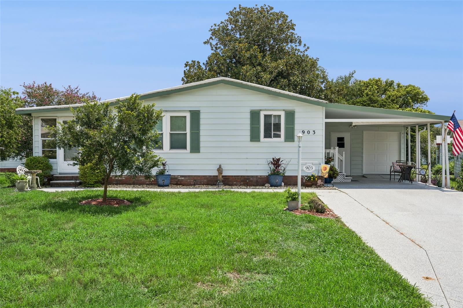 Welcome home to this charming 2-bedroom, 2-bath residence in the highly sought-after Orange Blossom Gardens community of The Villages in Lady Lake! Perfectly suited for enjoying the renowned Villages lifestyle, this well-maintained home offers comfort, convenience, and plenty of space to relax and entertain.

Inside, you'll find a thoughtfully cared-for home featuring a finished garage with ample room for your vehicle, golf cart, and additional storage. Situated on an oversized lot with mature, lush landscaping, the property provides exceptional curb appeal along with generous parking for family and guests.

Whether you're hosting friends or simply enjoying Florida's beautiful weather, the spacious outdoor setting offers endless possibilities. Ideally located just minutes from golf courses, recreation centers, pools, shopping, restaurants, medical facilities, and the world-famous entertainment and town squares that make The Villages such a desirable destination, you'll have everything you need right at your fingertips.

Whether you're looking for a full-time residence or seasonal retreat, this move-in-ready home is an exceptional find. Don't miss your chance to own a piece of The Villages lifestyle. Schedule your private showing today!