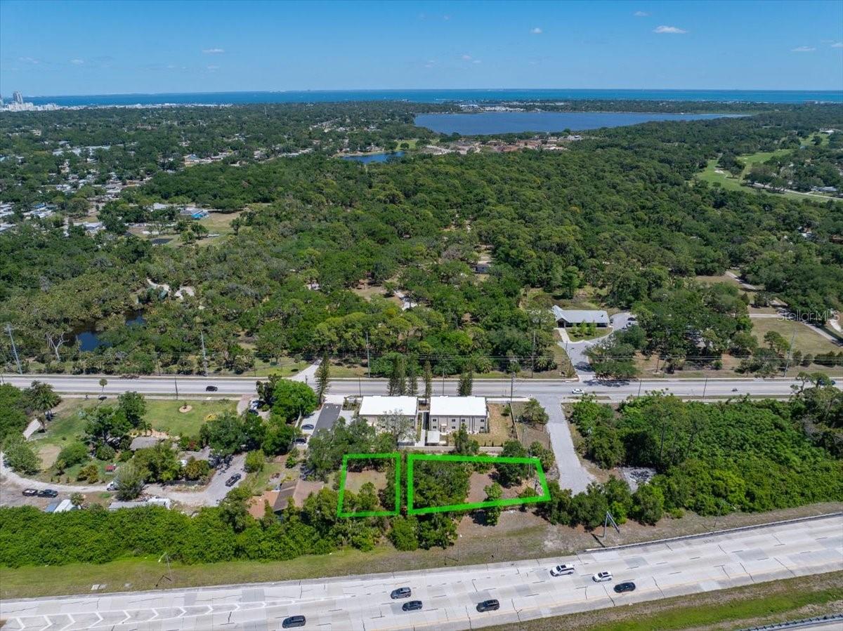 Welcome to 30th Ave S & Erie St S — a rare double parcel opportunity offered at $275,000! This combined .35-acre (15,756 sq ft) property includes two parcels with a 16-ft alley running between them that may be eligible to be vacated, creating an even larger, more functional footprint. Zoned Residential Medium / Neighborhood Multifamily, this site presents an excellent opportunity for investors and builders to develop townhomes or multifamily units in a growing area. Located directly across from Boyd Nature Preserve and surrounded by the established Lakewood Estates neighborhood, the property offers both natural appeal and strong surroundings, with convenient access to I-275 and 31st St S. Just minutes to downtown St. Petersburg (approx. 10 minutes), the Gulf beaches (approx. 15 minutes), and close to schools, shopping, and everyday essentials, this is a prime opportunity to build, invest, or hold in a high-demand location.