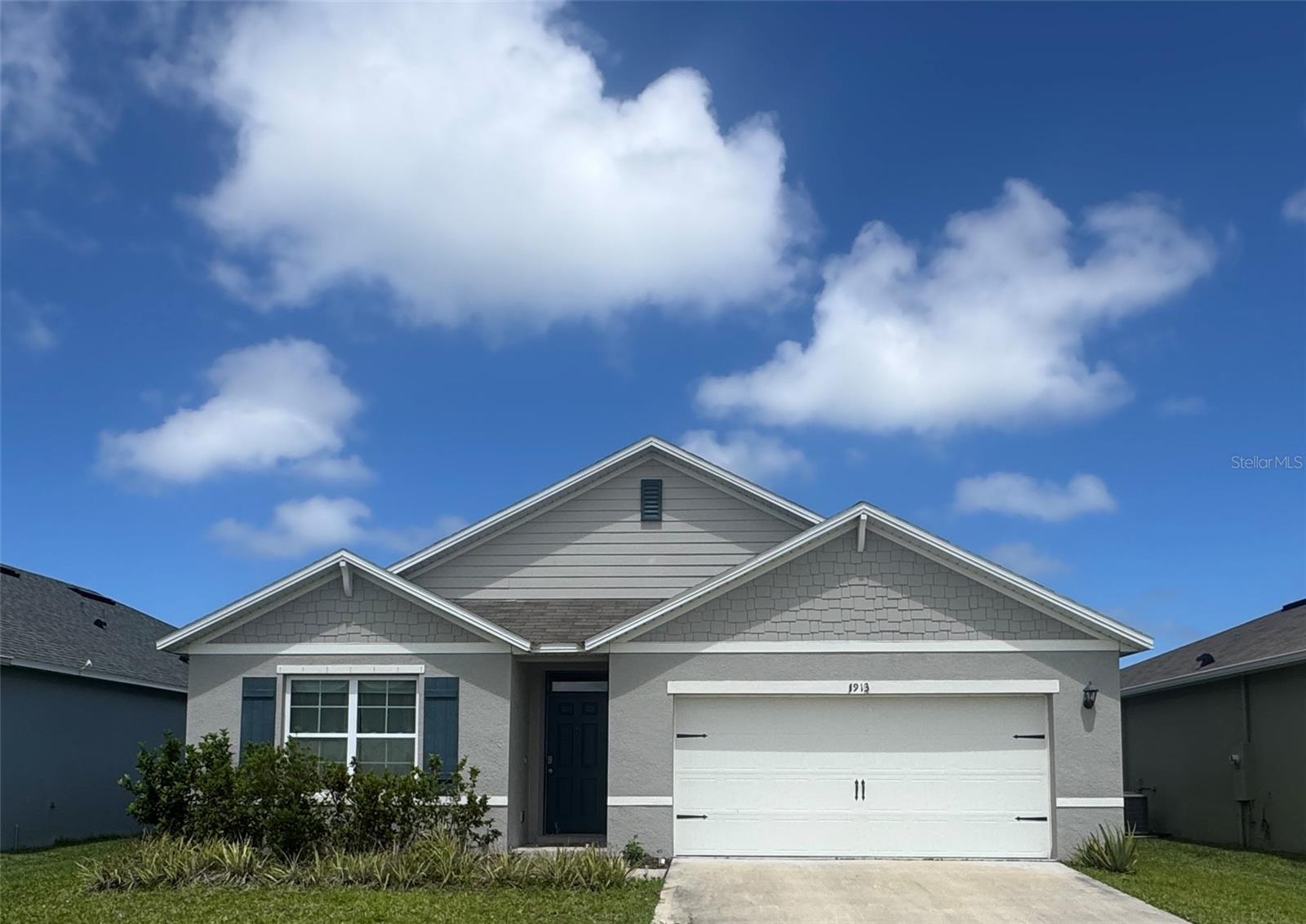 You are welcomed to view this beautifully built in 2021 home by D.R. Horton, offering a perfect blend of modern comfort, thoughtful design, and year-round Florida living with beautiful water views. With 4 spacious bedrooms and 2 well-appointed bathrooms, this residence boasts an open, light-filled floor-plan ideal for both everyday living and entertaining. In the heart of the home you will find open plan kitchen with amazing water views, sleek granite countertops, a large pantry, and plenty of storage—perfect for gatherings and daily routines. Practical comforts continue with a centrally placed inside laundry room and a generous double-car garage. The 1,850 square feet of finished living space, provides plenty of room for family, guests, or a dedicated home office. Located in a community where homeowners can  enjoy access to a welcoming clubhouse and sparkling community pool—perfect for relaxation, socializing, and making lasting memories. The neighborhood is well-kept and family-friendly, reflecting pride of ownership throughout. Beyond the community, you’re just a short drive from the Atlantic Ocean and some of Florida’s most beautiful beaches. Whether it’s early morning walks along the shore, weekends of surf and sun, or exploring local dining and entertainment options, its the best that coastal living can offer. Close to shopping, recreation, and major roadways for easy commuting, This home is perfect whether you are vacationing or living in it full-time.