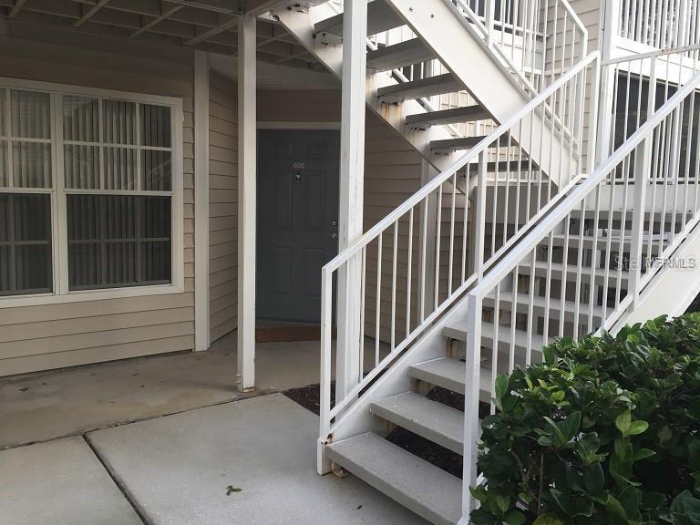 Unfurnished ground level unit. This is an end unit with views of the water feature. New tile and paint throughout! Fire place beautiful lanai areas off both living room and master bedroom. Kitchen/dining/ living open space. Community has gym, heated pool and spa, plus lighted tennis courts and a fitness center. BBQ area water/sewer/basic cable tv included. Great location - Publix across the street, close to lots of stores and restaurants. No pets.