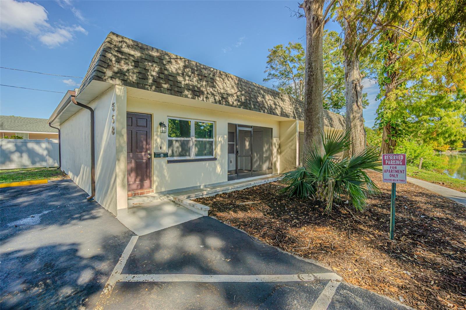 Charming and completely renovated 1-bedroom, 1-bath residence located in a quiet, boutique property with only three units. This move-in-ready home features spacious living areas, air conditioning, in-unit washer and dryer, a screened porch, and a private backyard area. Enjoy peaceful views of a picturesque pond/lake and a serene setting while remaining close to everyday conveniences. Ideally situated near shopping, dining, Largo Central Park, HCA Florida Largo Hospital, and just a short drive from the beautiful Gulf Coast beaches. An excellent opportunity to enjoy comfortable Florida living in a highly convenient Largo location
