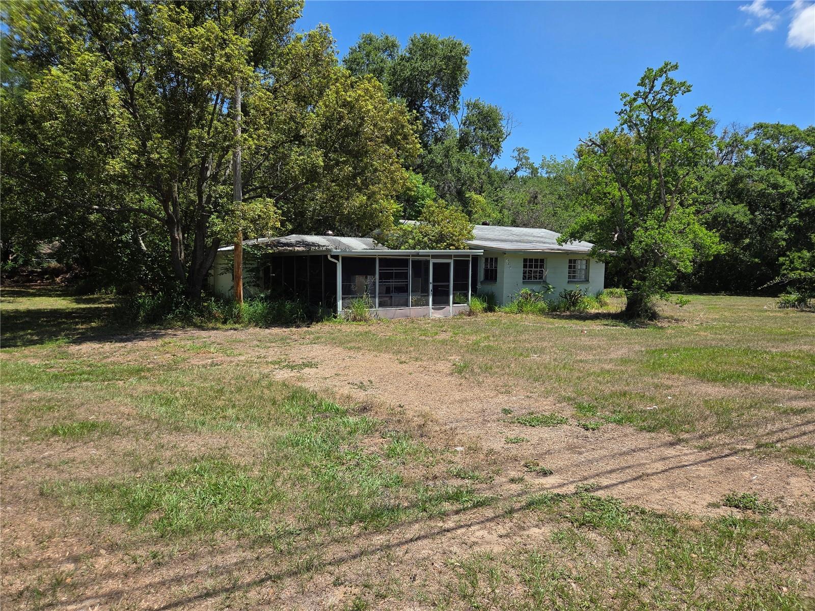 FIXER UPPER!  Older home on 4.24 acres.  Property is prime development property in area of new homes.  The home has not been lived in for many years.