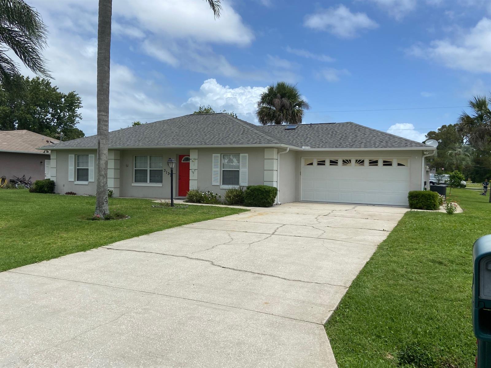 Well maintained, 3 bedroom 2 bath home in Florida Shores, Split Floor plan as you enter to living room master bedroom is to the right with ensuite bathroom with shower and walk in closet, to the left of the living room are two additional bedrooms with a bathroom off the hallway, bathroom is tub/shower.  Straight ahead from living room is dining room that leads to a very nice Florida room over looking the yard which has a Shed and lots of nice plants, the kitchen is a galley style kitchen with lots of natural light and has a breakfast nook as well. The laundry room is off the kitchen and comes with washer and dryer. Room for your toys and your car in the two car garage. There is a side door to the garage as well. Buffer zone to the South/right side of house 
Sprinkler system with reclaimed water. Close to Whistle Stop Park, Indian River Elementary, Publix shopping center. Just a short drive to the beach. Measurements approximate and should be verified. (Roof 3 years old, fall 2019) water softener and chest freezer in the garage do not convey ;Water: City