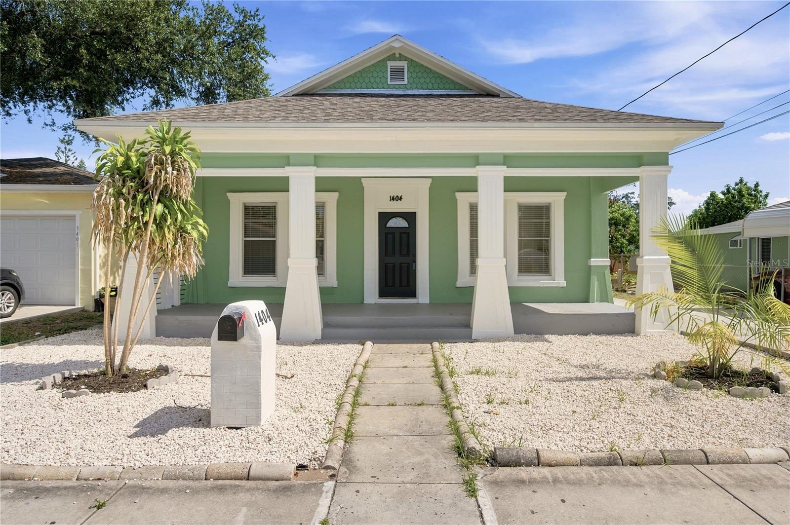 Standing Strong Since 1905 | Beautifully Restored Historic Block Home with a New Roof

This home has been standing proudly with it's thick wall and block construction for over a century! Beautifully restored, combining timeless character with modern updates, this move-in-ready residence has been thoughtfully renovated while preserving the architectural charm that makes historic homes so desirable.

Complete with a brand-new roof (May 2026), fresh exterior finishes, and a completely renovated interior will provide peace of mind to ti's next owner for years to come without sacrificing the home's original character. From the welcoming covered front porch and stately columns to the soaring ceilings and oversized windows, every detail reflects the strength and elegance of this classic Tampa home.

Inside, you'll find luxury vinyl plank flooring throughout, abundant natural light, and an inviting layout perfect for everyday living. The stunning chef's kitchen has been completely redesigned with shaker-style cabinetry, butcher block countertops, stainless steel appliances, modern fixtures, and ample storage.

Both bathrooms have been tastefully renovated with subway tile surrounds, matte fixtures, and contemporary lighting, creating a clean, timeless aesthetic. Spacious bedrooms, preserved architectural details, and quality finishes throughout make this home as comfortable as it is beautiful.

Situated just minutes from Downtown Tampa, Ybor City, Seminole Heights, Armature Works, the Riverwalk, and some of the city's best restaurants, breweries, and entertainment, this location offers the perfect blend of historic charm and urban convenience. With quick access to I-275 and major employment centers, commuting anywhere in Tampa Bay is effortless.

Schedule your private showing today and experience this remarkable home for yourself.