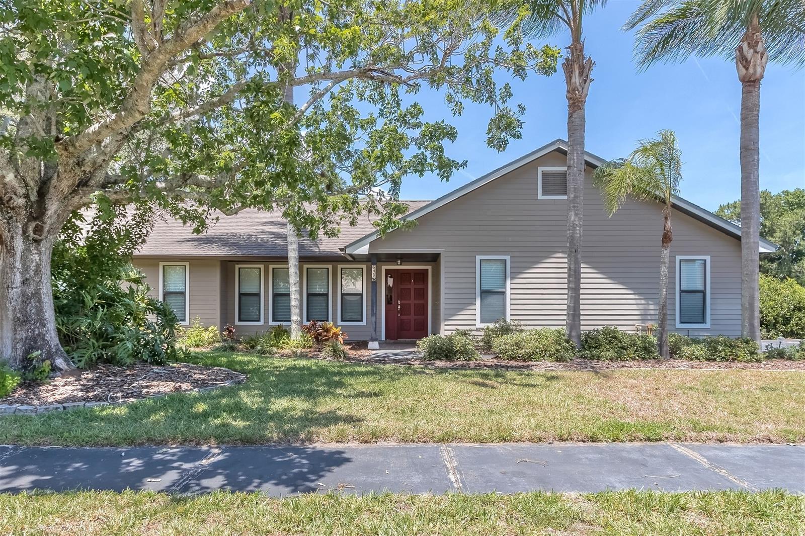 SPACIOUS MOVE IN READY home in coveted Gated Community of Pelican Bay minutes from BEAUTIFUL BEACHES and ORLANDO area. This light and airy home features vaulted ceilings in living and dining areas, large kitchen with plenty of storage and counter space for those who love to cook, including stainless appliances and an island with spice storage. OVERSIZED bedrooms and baths, with additional office/den at front of the home, tile and laminate throughout entire home NO CARPET in living spaces, fireplace in great room, large Florida room that leads to lush canal front backyard retreat. 20x22 2 car garage. Brand New CARRIER A/C unit 3/2021. Pelican Bay features 24 hr. gated community with roving security, Pelican Bay Golf Club with optional memberships.

ALL INFORMATION IS ASSUMED ACCURATE BUT NOT GUARANTEED. ALL MEASUREMENTS ARE APPROXIMATE. BUYERS AND THEIR AGENTS SHALL VERIFY ALL INFORMATION DEEMED IMPORTANT TO THEM. ;Water: City