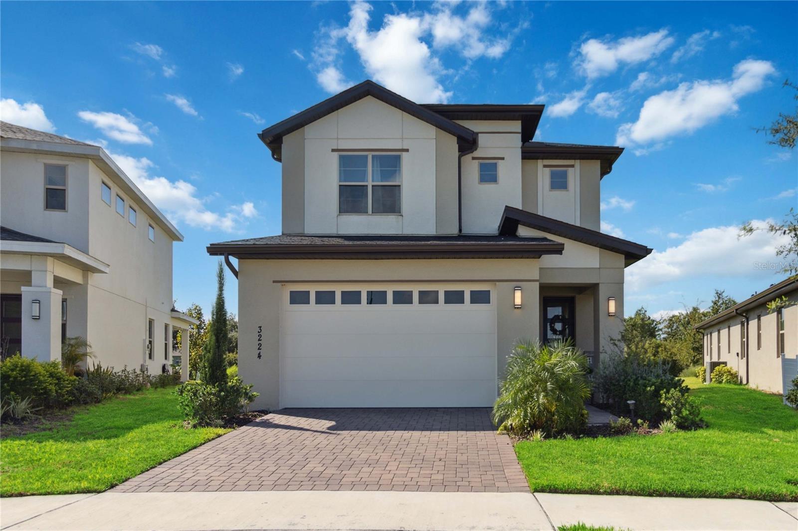 Welcome to this stunning, spacious home in the highly sought-after Harmony community—a gated, family-friendly neighborhood known for its top-rated, A-rated schools and exceptional amenities.

This thoughtfully designed residence features 4 generous bedrooms, including a luxurious primary suite conveniently located on the main floor. Upstairs, you'll find a versatile layout with one bedroom offering a private ensuite, plus two additional bedrooms, a full bathroom, and a cozy loft.

The main level boasts an open-concept design that seamlessly connects the living, dining, and beautifully upgraded kitchen—ideal for both everyday living and entertaining. The kitchen is a true centerpiece, showcasing modern finishes and high-end appliances that will delight any home chef.

A dedicated office downstairs offers flexibility and can easily serve as a 5th bedroom. Additional conveniences include a laundry room and a half bath on the main floor.

Natural light pours into the home through large windows and expansive sliding glass doors, leading to a serene screened-in lanai. Enjoy peaceful outdoor living with a spacious, private backyard and no neighbors in the front or rear—providing rare privacy and tranquility.

Living in Harmony means access to incredible amenities, including two resort-style pools, a splash pad, basketball and volleyball courts, a soccer field, boat dock, scenic nature trails, and dog parks—all surrounded by beautiful natural landscapes.

Don’t miss the opportunity to own this exceptional home in one of the area’s most desirable communities!