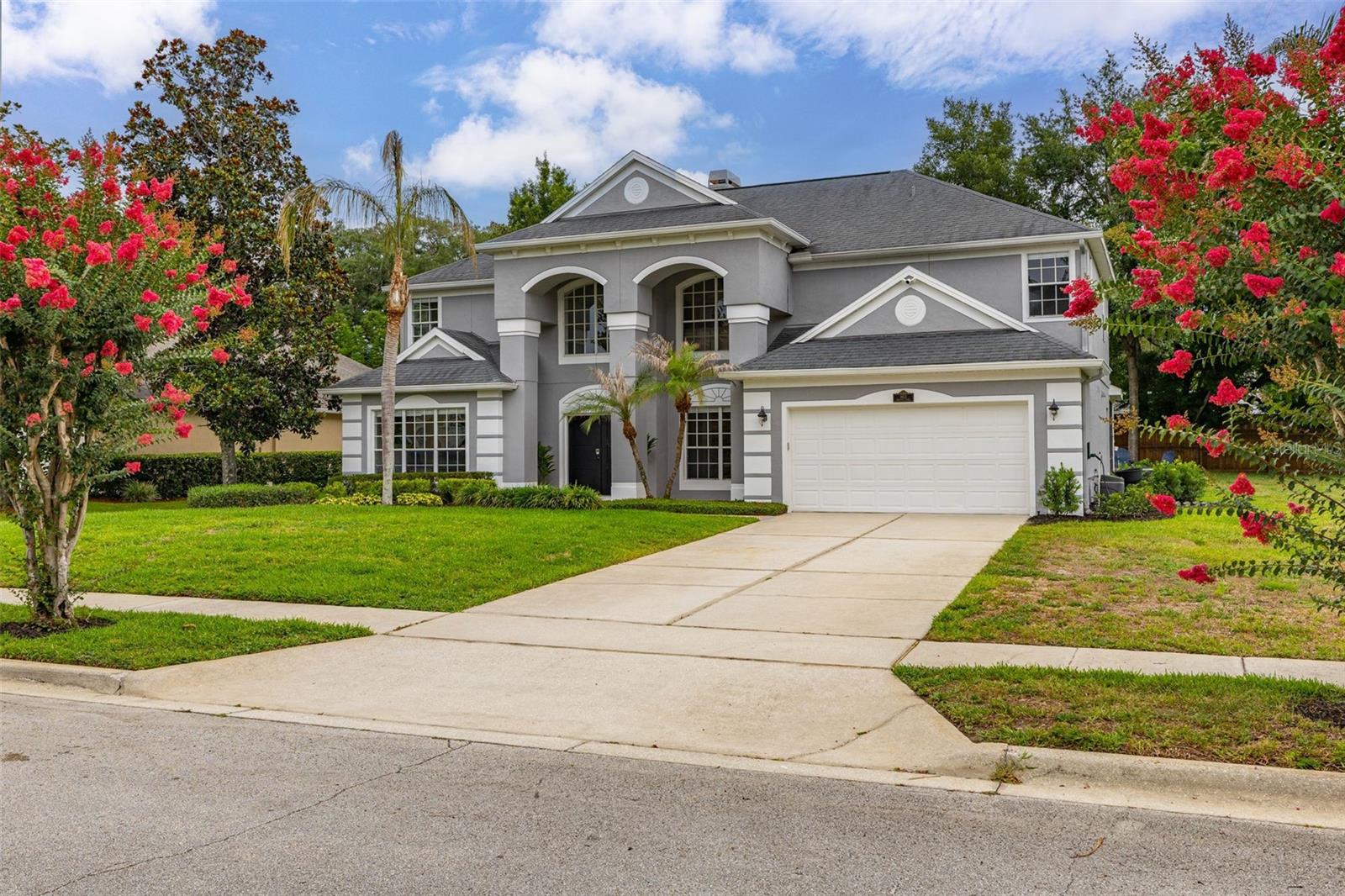Welcome to this exceptional 5-bedroom, 3.5-bathroom pool home in the highly sought-after community of Lake Sylvan Cove, where over $250,000 in luxury renovations have created a home that feels brand new while preserving the generous room sizes and thoughtful floor plan that are increasingly hard to find. Situated on a spacious 0.37-acre lot, this stunning home features all-new flooring, a completely redesigned gourmet kitchen, beautifully renovated bathrooms, an updated laundry room, custom built-in closets, and high-end finishes throughout. The open-concept layout offers multiple living and entertaining spaces, including a first-floor primary suite with pool views, a dedicated office, oversized additional bedrooms, and a large upstairs loft. Thoughtful upgrades continue upstairs, where each secondary bedroom is equipped with built-in speakers, adding a touch of luxury and convenience. Step outside to your private backyard retreat with a screened pool and spa, expansive lanai, and additional outdoor gathering space perfect for entertaining. Lake Sylvan Cove residents enjoy exclusive access to a private boat ramp on 188-acre Sylvan Lake for boating, skiing, and bass fishing, while the home’s convenient location provides easy access to Sylvan Lake Park, shopping, dining, I-4, and SR 429. If you’ve been searching for a move-in ready luxury pool home with modern designer finishes, oversized rooms, and an unbeatable lifestyle, this is a rare opportunity you won’t want to miss.