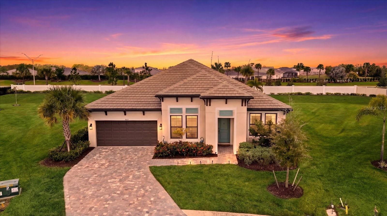 The largest and most private lot in Sweetwater at Lakewood Ranch. This 0.36-acre cul-de-sac property sits on one of the highest elevations in the community (66 ft above sea level) and offers no rear neighbors plus two oversized side yards.

This 4-bedroom + office, 3-bath pool home features an open layout designed for indoor-outdoor Florida living. Large sliding glass doors open to a screened lanai with pool and spa, creating a private backyard retreat ideal for relaxing or entertaining.

The outdoor space has been upgraded with a saltwater pool system, Aqualink Wi-Fi pool controls, integrated cage lighting, paver sealing, and a 600-watt waterproof Bluetooth audio system for the lanai. It is also pre-plumbed and pre-wired for an outdoor kitchen and includes water softener connections.

Inside, the home offers luxury vinyl flooring in the main living areas, tray ceilings, and a spacious kitchen featuring a large breakfast bar overlooking the living space plus a separate café dining area.

This home is equipped with extensive smart-home technology, including Alexa and Google Assistant integration, voice-controlled outlets, occupancy sensors, Yale keyless locks, and a 3-camera security system. The system can control lighting, HVAC, pool equipment, and outdoor lighting.

Additional improvements include a covered front porch, hurricane-impact glass throughout including PGT sliders, front gutters, upgraded attic access, motion-sensor lighting, exterior paint, and an updated backflow system.

Ideally located within walking distance to the future Lakewood Ranch High School (anticipated completion 2027/2028), Lake Manatee K-8 School, Premier Sports Campus, aquatic center, sports fields, and the Lakewood Ranch Library.

Residents enjoy this maintenance free community with access to resort-style amenities including a clubhouse, fitness center, heated pool, pickleball courts, playground, and walking trails.