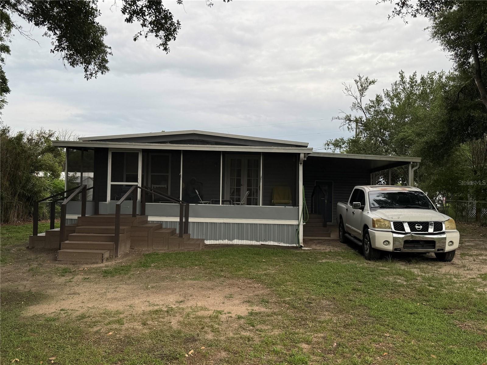 Welcome to this charming and affordable home situated on a spacious 0.30-acre lot in the heart of Summerfield! This well-maintained property offers comfortable living with 2 bedrooms, 2 bathrooms, and a flexible bonus room that can be used as a home office, hobby room, or additional living space. Recent improvements include brand-new front and rear porches, providing the perfect places to relax, entertain, and enjoy Florida's beautiful weather year-round. The property also features a large utility/storage addition, offering ample space for tools, equipment, hobbies, or workshop use. With no HOA and plenty of outdoor space, you'll appreciate the peaceful setting while still being conveniently located near shopping, dining, medical facilities, and The Villages. Whether you're looking for a full-time residence, seasonal retreat, or investment opportunity, this property offers exceptional value and potential. Schedule your private showing today! ???