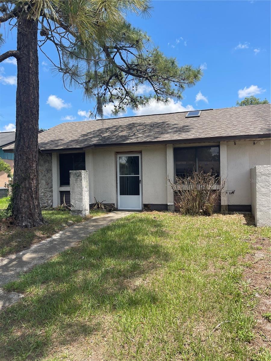 Under contract-accepting backup offers. Excellent investor opportunity in Orlando! This two-bedroom, two-bath half duplex offers great potential for renovation and value-add improvements. Major updates have already been completed, including a new roof (2023), air conditioner (2018) and water heater (2025). Inside, you'll find vaulted ceilings, an open floor plan and plenty of natural light. The fenced backyard overlooks a peaceful lake, providing a scenic setting rarely found at this price point. With no HOA, you'll enjoy added flexibility and fewer restrictions. Conveniently near the University of Central Florida, Valencia College East Campus, Advent Health, shopping, dining and major roadways. Whether you're looking for your next investment property, rental opportunity or fixer-upper project, this home offers a solid foundation and endless possibilities.
