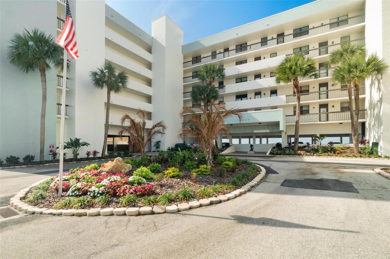 Excquisite Coastal Retreat on beautiful Madeira Beach! The elegant condo has been COMPLETELY UPDATED with the finest appointments, including TAVERTINE FLOORS THROUGHOUT!  Impact Windows and Doors, custom built in shelving with granite shelving, PLANTATION SHUTTERS, Crown Molding, and matching stainless steel appliances in the kitchen. This is the only unit in this complex with this custom floor plan! It is also a split floor plan. Two large walk in closets, HURRICANE SHUTTERS, washer and dryer, and this condo is being sold FURNISHED!! Walk to restaurants and bars and you are just a skip from the Famous St. Johns Pass and Boardwalk, where there are varieties of shops, restaurants, bars and entertainment. 1 mile down the road from new Publix Supermarket, 20 minutes to downtown St. Petersburg, and 35 minutes to Tampa International Airport. Whether you are looking for a vacation getaway, an investment property, or a permanent residence, this condo has it all. Min 30 day rental.