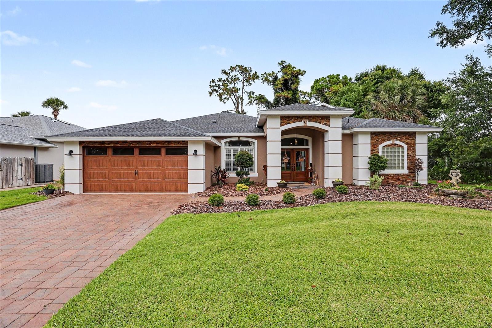 COMPLETELY RENOVATED and looks like a model home! This stunning waterfront home in the GATED COMMUNITY of Sheridan Woods offers 4 bedrooms, 3.5 baths, and 2,840 sq. ft. of beautifully updated living space. The bright, open floor plan features updated flooring, spacious living areas, and a kitchen that flows seamlessly into the heart of the home. Major improvements include a NEW ROOF, NEW HVAC system, remodeled bathrooms, fresh exterior paint, updated light fixtures, beautiful landscaping, custom wood front door with IMPACT GLASS, and a hurricane-rated garage door. Upstairs, a versatile loft with a full bath is perfect for guests, a home office, or media room. Relax and enjoy PEACEFUL WATER VIEWS from the pergola-covered patio and private spa. Conveniently located and move-in ready! You don't want to miss this one!