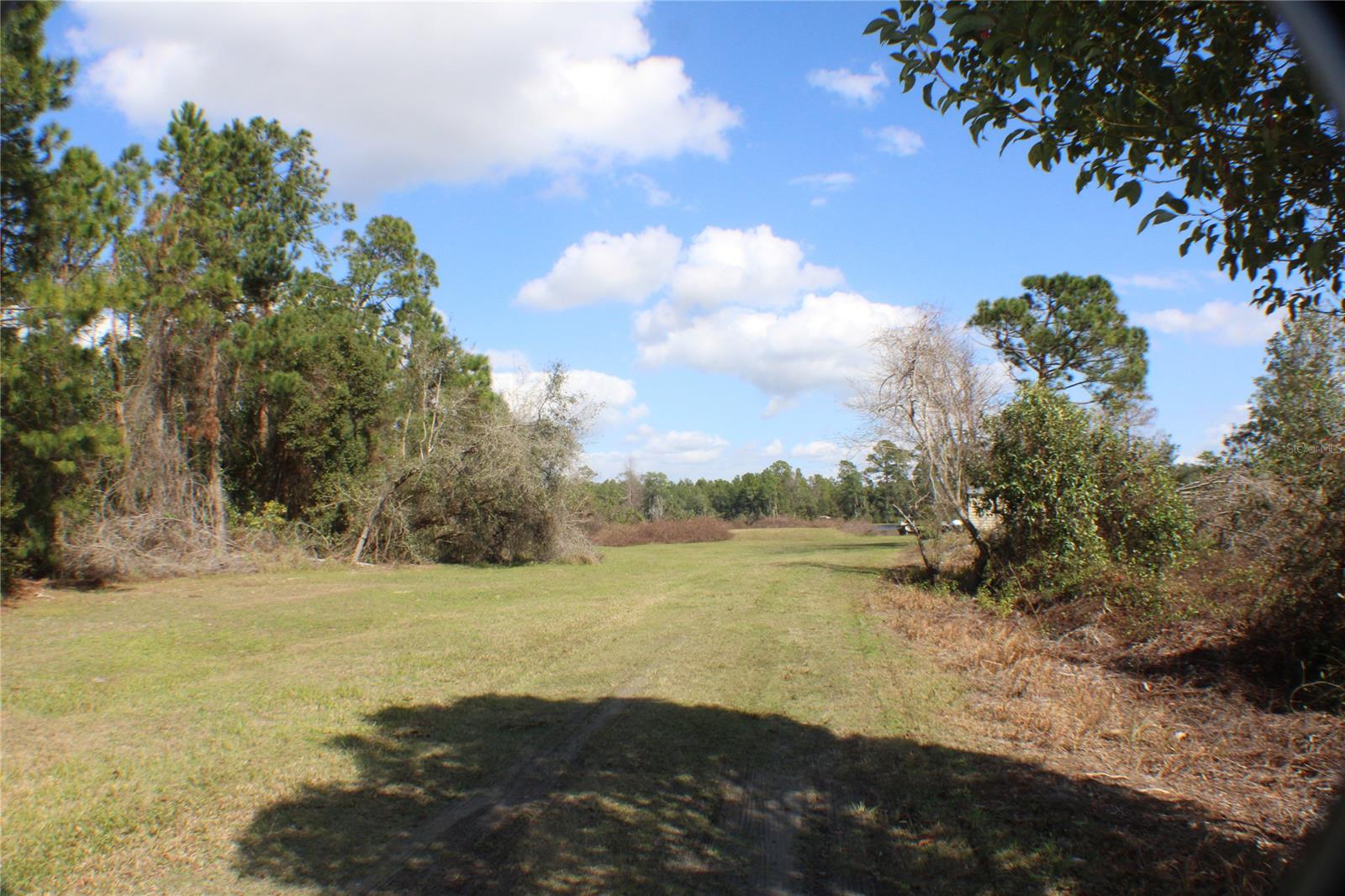 Lakefront home site in quiet setting and private with 1.6 acres directly on Bear Lake.; Cleared: Partial