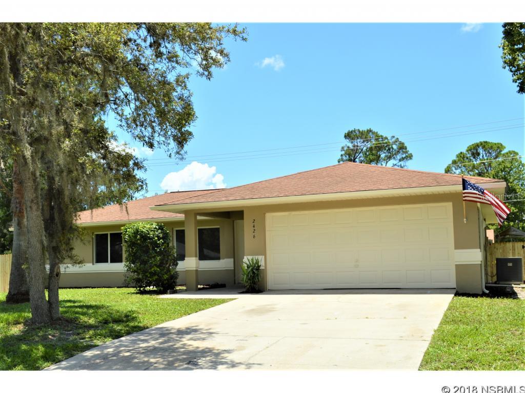 Nicely remodeled and move in ready. This home boasts an open floor plan and is light and bright with vaulted ceilings. New interior and exterior paint, New kitchen and New stove and refrigerator. Also includes new hot water heater.  All bedrooms are large and each has its own walk-in closet. The kitchen/dining/living-room design allows for family gatherings where everyone is all together. Nice back patio is screened and large backyard is fenced, with privacy fencing on both side property lines. Includes large two car garage. Perfect family home or starter or retirement home with central location to shopping, restaurants, the riverfront parks and the beach. Close to expressways for ease of travel to and from work. Sold AS IS, inspections welcomed. Come see... ;Water: City