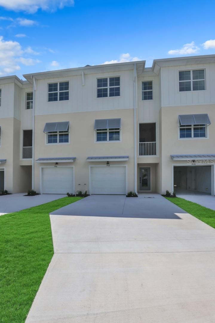 MOVE IN READY! STUNNING BRAND NEW THREE STORY BLOCK TOWNHOMES BY TOLL BROTHERS NOW FOR SALE! Minutes away from world-renowned beaches! There's no shortage of amenities in this community, from the private clubhouse with fitness center, heated resort style pool, tennis courts that are converted to pickle ball, cookout area, fire pit, fishing dock and kayak launch! You'll also find plenty of walking trails throughout the community. Quiet homesite away from traffic noise with that backs up to the bayou with stunning views. You'll love this spacious open floorplan with high ceilings throughout. This stunning gourmet kitchen will be the centerpiece of the home. Relax on your private two-story screened in front balcony. Plenty of room for family and friends with 3 bedrooms & 3 baths plus additional loft space! Quality home featuring quality construction, in house sprinklers and impact windows and doors. The huge garage will accommodate 2 cars plus additional storage space for kayaks, jet skis, or bikes. Call to schedule an apt today!