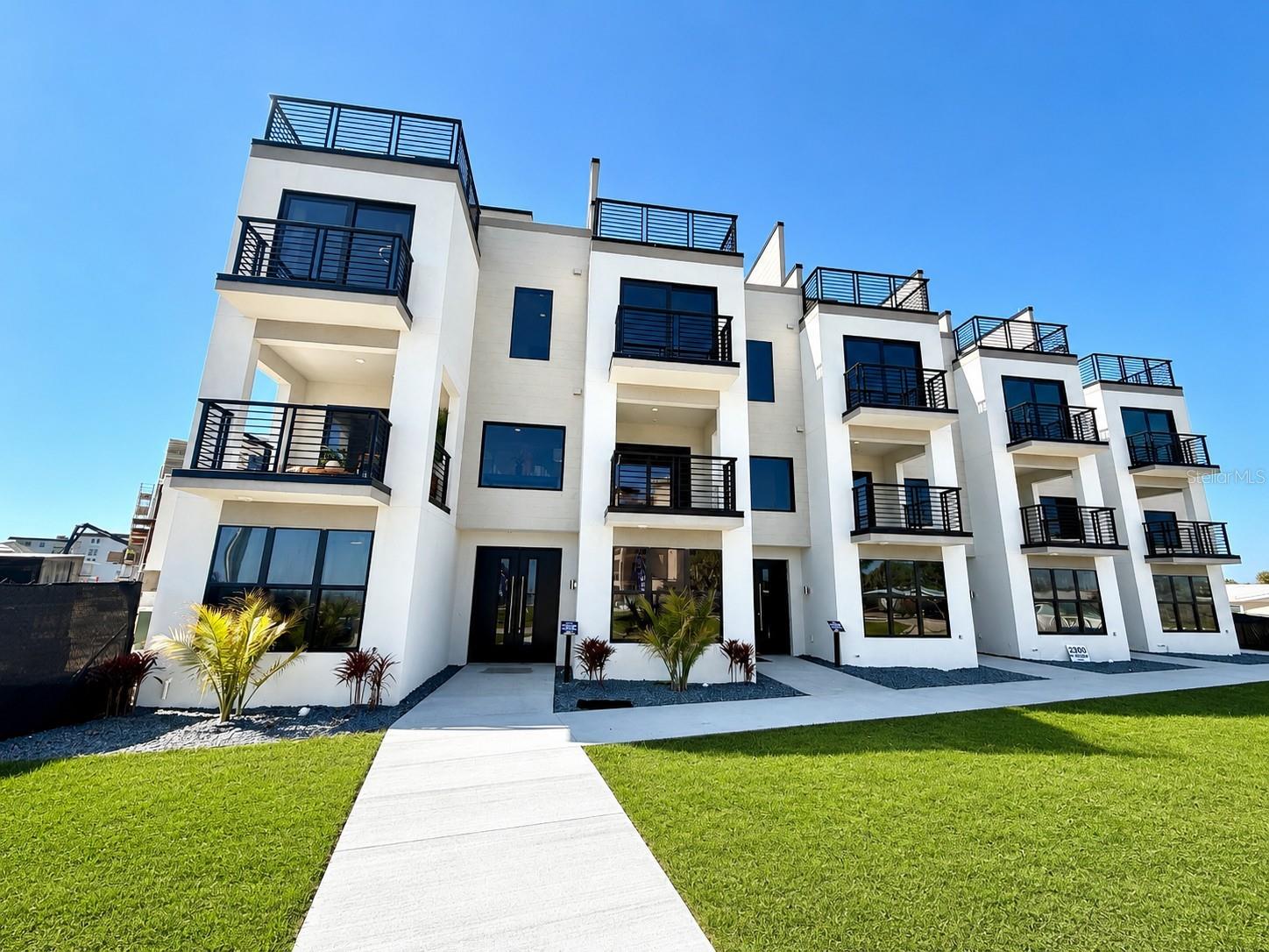 Virtually Staged. Under Construction. Welcome to your luxurious residence in the brand-new, elevated condominium community of Bailey By The Sea, locateddirectly across from the beach. This meticulously designed development embodies the essence of upscale coastal living, offering a comprehensivearray of features tailored to meet your every need. This unit is the Wavecrest floor plan that spans four floors and encompasses 2,586 square feetof living space, complete with multiple patios to fully appreciate the breathtaking beach views across the street. Upon entering through thedouble doors, you are greeted by an elegant foyer that provides access to a two-car garage and a versatile bedroom or flex space, complete withits own ensuite bathroom. Ascend through the four levels via your private elevator, leading you to the main living area on the second floor. Thislevel features a well-appointed designer kitchen that overlooks the dining area and great room, as well as a dedicated study area for yourconvenience. Step outside to the open porch and enjoy the refreshing sea breeze. The third floor houses an additional bedroom, a laundry room,and a primary suite. The primary suite is a true retreat, offering an oversized walk-in closet and an ensuite bathroom equipped with dual sinksand a shower. Notably, the suite features a balcony that provides stunning views right from your bed. The crowning jewel is the fourth floor, whichboasts two sky decks bathed in the enchanting sunrises of Florida's East Coast. This space includes a built-in outdoor kitchen, making it ideal forentertaining guests. A great room located between the two sky decks, along with a half bathroom, adds to the convenience and enjoyment of thisupper level. The indulgence extends throughout the fully gated community of Bailey By The Sea, which features a resort-style pool and deededBEACH ACCESS. This community comprises a total of 32 units, with living spaces ranging from 2,554 to 2,793 square feet, available in fourdistinct floor plans and three exquisite design schemes. Situated between Daytona Beach and Flagler Beach, Ormond Beach offers a plenty ofdining, shopping, and entertainment options. Enjoy a leisurely stroll through downtown Ormond Beach for a small-town atmosphere, or explorethe natural trails and fishing dock at Michael Crotty Bicentennial Park. This is the elevated Florida lifestyle you have been seeking—don’t miss theopportunity to make this extraordinary condo your home. (Photos being used could vary depending on floor model and design package)