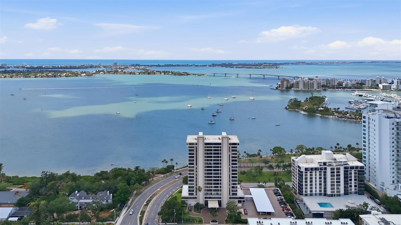 Experience elevated coastal living at its finest in 2-bedroom, 2-bath corner residence at 770 S Palm Avenue #1501. Perched high above the city, this sought after location boasts western, eastern, and southern exposures, delivering breathtaking panoramic views of Sarasota Bay, the Gulf of Mexico, and the vibrant downtown skyline—along with unforgettable sunrises and sunsets. Step inside to discover a well designed open-concept layout filled with natural light, enhanced by expansive floor-to-ceiling windows.  The spacious living and dining areas flow effortlessly, creating an ideal setting for both everyday living and entertaining. A updated kitchen features premium appliances, sleek modern cabinetry, and stone countertops. The owners suite offers a private retreat with stunning water views and a terrace overlooking Selby Gardens and Sarasota. The second bedroom provides flexibility for guests or a home office. Residents enjoy resort-style amenities, including a saltwater pool, fitness center and secure parking—all in a premier downtown location just moments from world-class dining, shopping, arts, and the pristine Gulf Coast beaches. This is more than a home—it’s a lifestyle. Schedule your private showing today.