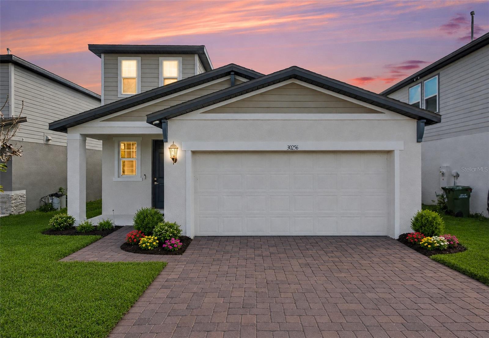 Welcome home to this beautifully maintained 4-bedroom, 2.5-bath residence in the sought-after Lake Denham Estates community. Built in 2023, this two-story home offers 2,170 square feet of thoughtfully designed living space, featuring a first-floor primary suite, a spacious kitchen with stone counters, a center island, and walk-in pantry, plus an open-concept great room ideal for entertaining. Upstairs, a versatile loft provides bonus living space alongside three generously sized secondary bedrooms. Enjoy energy-efficient construction, a two-car garage, and a private backyard situated on a conservation lot. Lake Denham Estates offers fantastic community amenities including a pool, playground, and sidewalks, all just minutes from US-27, the Florida Turnpike, and the Lake Harris boat ramp. Don't miss this move-in ready opportunity in a prime Lake County location! Listing photos may be virtually staged.