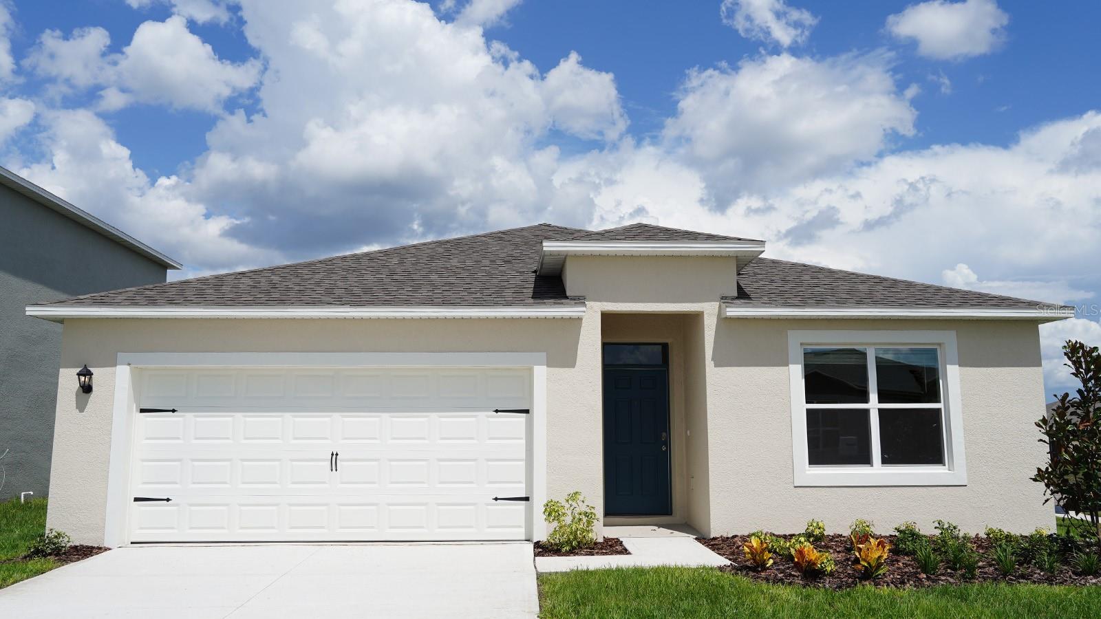 Under Construction. Introducing the Cali floorplan at Fox Branch, in Lakeland, Florida, where every square foot is put to use with sophistication and comfort.

Inside this 4-bedroom, 2-bathroom home, you’ll find 1,828 square feet of comfortable living. This meticulously designed residence combines modern convenience with timeless elegance, showcasing quartz counters and tile floors throughout.

As you step inside, you are greeted by an inviting foyer that leads you into the heart of the home. The open-concept layout seamlessly connects the living room, dining area, and kitchen, creating a perfect space for entertaining family and friends. The spacious living room features abundant natural light, thanks to large windows that provide picturesque views of the surrounding landscape. With ample room for seating, it's an ideal spot for relaxation and gatherings.

The kitchen is a true highlight, including granite countertops, sleek stainless-steel appliances, a walk-in pantry and an oversized island with a breakfast bar. Whether you're preparing a casual meal or hosting a formal dinner, this kitchen is well-equipped to meet your culinary needs.

The four generously sized bedrooms offer flexibility for various lifestyles. The primary suite located in the rear of the home is a tranquil retreat, featuring a private ensuite bathroom with dual sinks, a separate shower, and a walk-in closet. The remaining three bedrooms share one well-appointed bathroom, making morning routines a breeze. Laundry won't be a chore with its dedicated space convenient to all bedrooms.

Like all homes in Fox Branch, the Cali includes smart home technology, which allows you to control your home anytime with your smart device while near or away.

Whether you're seeking a peaceful family retreat or a stylish place to call your own, this home is sure to meet your every need. Contact us today and find your home at Fox Branch.

*Photos are of similar model but not that of the exact house. Pictures, photographs, colors, features, and sizes are for illustration purposes only and will vary from the homes as built. Home and community information including pricing, included features, terms, availability, and amenities are subject to change and prior sale at any time without notice or obligation. Please note that no representations or warranties are made regarding school districts or school assignments; you should conduct your own investigation regarding current and future schools and school boundaries.*