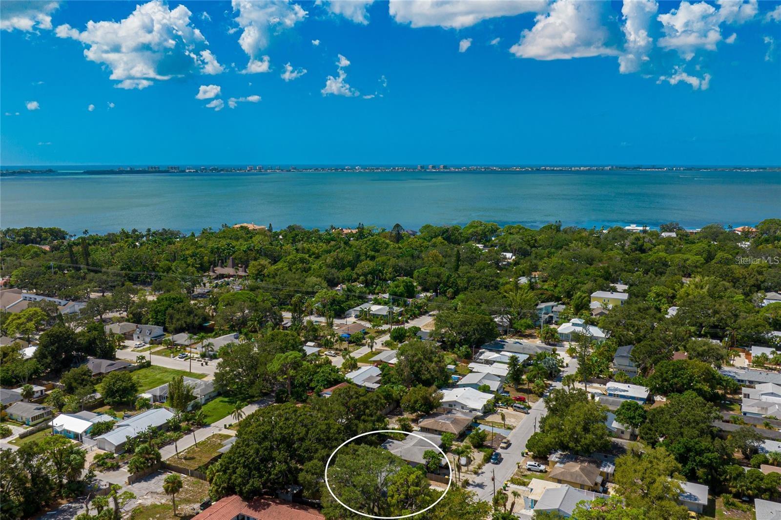 Virtually Staged. Welcome to the highly sought-after Indian Beach neighborhood, perfectly positioned West of the Trail and just minutes from the heart of downtown Sarasota. Situated on a quiet cul-de-sac with exceptional privacy, this 3-bedroom, 2-bathroom home offers an incredible opportunity to create your own coastal retreat in one of Sarasota’s most exciting growth corridors.

Inside, you’ll find an open-concept kitchen and living area filled with natural light, offering a functional layout ready for your personal touch or renovation vision. The oversized fenced backyard provides endless possibilities whether you dream of adding a pool, creating an outdoor entertaining oasis, or simply enjoying the peaceful setting beneath mature trees.

Located just steps from Sarasota Jungle Gardens, Sarasota Bay, and Ringling College of Art & Design, this property also places you only 5 miles from the world-renowned sands of Lido Beach. In addition, the home benefits from close proximity to the transformative master-planned The Bay, Sarasota’s new Bayfront Park and waterfront expansion project, one of the most impactful developments shaping the future of Sarasota north of Fruitville Road

Whether you are looking for a primary residence, seasonal getaway, investment property, or flip opportunity, this home offers outstanding potential in a prime Sarasota location.