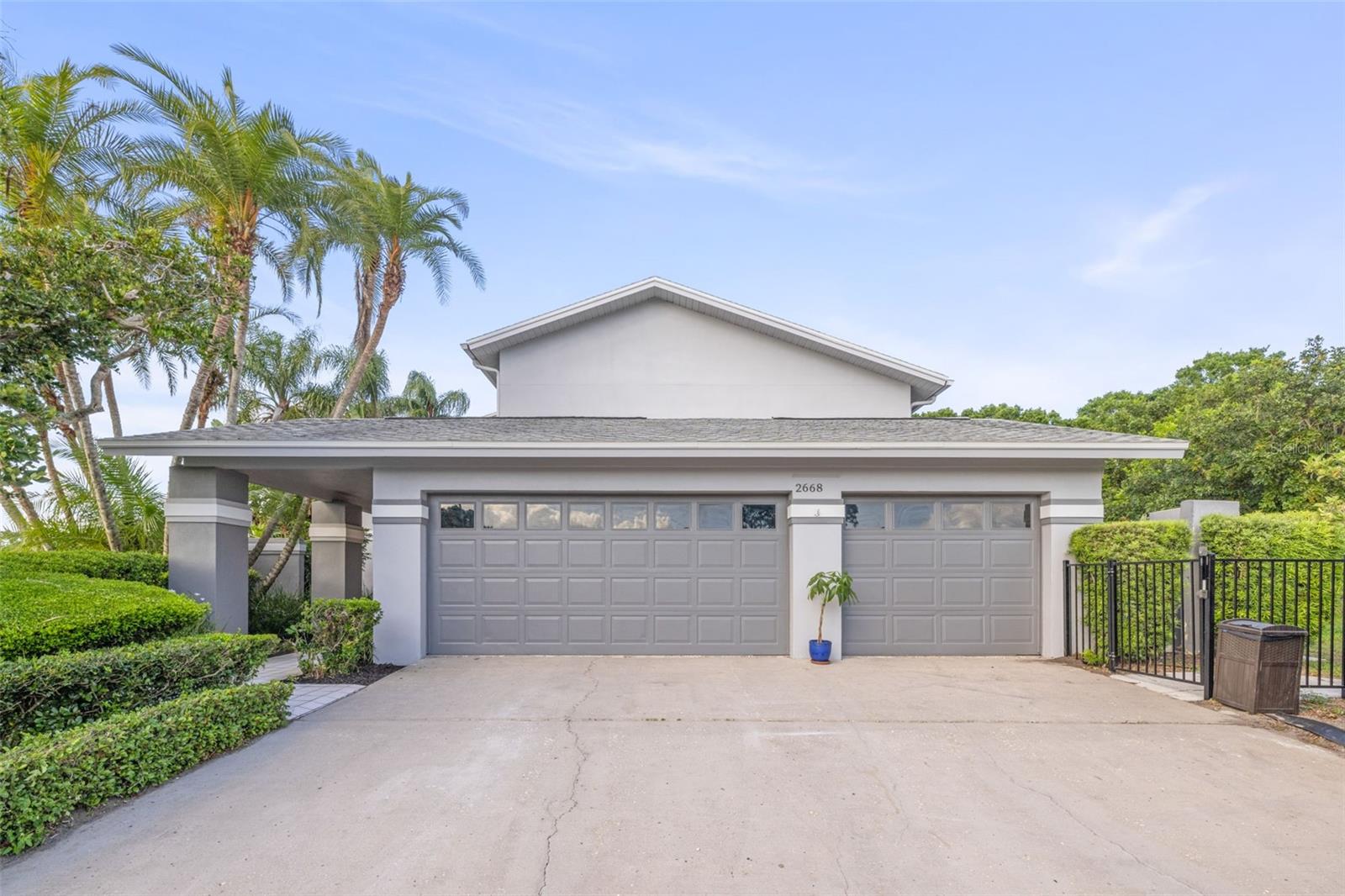 One or more photo(s) has been virtually staged. 2.5% VA ASSUMABLE LOAN — open to civilians and veterans. The Loan Itself Is Worth $315,000 — present value of paying 2.5% vs. today's 6.4%. 4,300+ SQFT Turn-Key Move-In Ready Golf Course Estate on .51 acres in Countryside, Clearwater FL. 4 BEDROOMS, 3.5 BATHROOMS. 1,000+ SqFt Master Wing — nearly 1/4 of the home. 185 Ft Golf Course Frontage on Countryside Country Club — Bayhead Hole #2. No Flood Insurance Required — high and dry. All Major Systems Updated 2021. $90,000 Recent Renovation. Remodeled Spa-Inspired Baths.
ATTENTION BUYERS: UNBEATABLE OPPORTUNITY — STOP THE SEARCH. The ultimate financial "unicorn." Imagine a million dollar+ estate locked into a STAGGERINGLY LOW 2.5% INTEREST RATE. The Loan Itself Is Worth an estimated $315,000 — present value of paying 2.5% instead of today's 6.4% market rate over the remaining 25-year term. SMART CAPITAL meets "Modern Organic" luxury.
THE COUNTRYSIDE MASTERPIECE | LUXURY REIMAGINED. Situated in the heart of Countryside overlooking Countryside Country Club, this Turn-Key Move-In Ready estate pairs massive scale with a recently completed CURATED $90,000 Recent Renovation. Perched high and dry (No Flood Insurance Required) on a 1/2 ACRE LOT with 185 Ft Golf Course Frontage (Bayhead Hole #2). 4,300+ SQFT of elite living space.
THE 2026 LUXURY REVOLUTION — high-end finishes, clean industrial lines:
• DESIGNER CHEF'S KITCHEN: Custom cabinetry and one-of-a-kind TERRAZZO & STAINED CONCRETE countertops.
• REMODELED SPA-INSPIRED BATHS: All 4 baths — WHITE SHAKER VANITIES, PREMIUM QUARTZ, BACKLIT MIRRORS.
• UNIFIED MODERN FLOORING: 4,000+ SQFT of new LIGHT OAK LUXURY VINYL PLANK throughout.
• ARCHITECTURAL ARRIVAL: MATTE BLACK entry doors and refinished MATTE BLACK SPIRAL STAIRCASE.
• FRESH PAINT: SHERWIN-WILLIAMS ALABASTER throughout.
• LED RECESSED LIGHTING with MATTE BLACK hardware and screwless faceplates.
THE PRIMARY WING: 1,000+ SqFt Master Wing — nearly 1/4 of the home. A true "home within a home":
• FLEX SPACE: Dedicated wing for executive office, gym, or nursery.
• MASSIVE STORAGE: FOUR LARGE WALK-IN CLOSETS.
• REFRESHED RETREAT: Dual shaker vanities, quartz tops, RAIN SHOWER HEAD.
All Major Systems Updated 2021 — Insurance-Ready 4-Point Audit:
• ROOF: Full Replacement (2021).
• HVAC: Dual-system replacement (2021).
• ELECTRICAL: Main Panel upgrade (2021).
• PLUMBING: New Hot Water Heater (2021), Water Softener & Sprinkler Controller (2022).
• SECURITY: Black aluminum fully fenced backyard (2022).
AN ENTERTAINER'S DREAM. SOARING CEILINGS, floor-to-ceiling golf course views. 4TH BEDROOM ENSUITE on main level — perfect for guests or office. OPEN-AIR POOL & SPA, oversized 3-car garage, designer landscaping.
LOCATION: Golf-cart distance to Countryside Country Club. Convenient to Tampa International Airport, top-rated beaches, and Tampa Bay dining.
THIS IS THE ONE. Bold architecture, modern luxury, Turn-Key Move-In Ready, 1,000+ SqFt Master Wing, Remodeled Spa-Inspired Baths, 185 Ft Golf Course Frontage on Countryside Country Club, and a GENERATIONAL 2.5% VA Assumable Loan — The Loan Itself Is Worth $315,000+ vs. TODAY'S MARKET. Schedule your private tour today!
DISCLAIMER: Info deemed reliable but not guaranteed; verify independently. 2.5% VA assumption subject to lender approval, eligibility, and equity-gap payment by buyer. Sold As-Is. Savings estimate based on 6.4% market rate; actual results may vary.