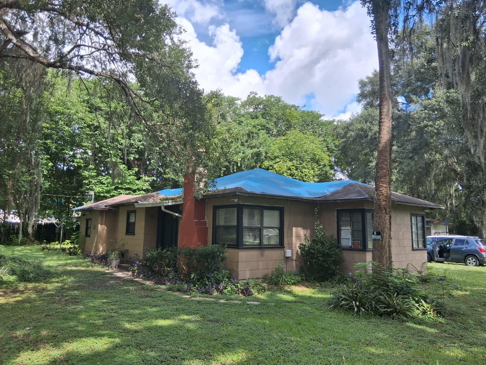 Exceptional investment opportunity with outstanding income potential! Nestled on a spacious lot surrounded by beautiful green space, this property offers endless possibilities for rental income, future improvements, or long-term appreciation. Its prime location with convenient access to the main highway provides excellent connectivity while maintaining a peaceful setting. Whether you're looking to expand your investment portfolio, create a profitable rental property, or own a home with room to grow, this is a rare opportunity you won't want to miss. Schedule your private showing today and discover the incredible potential this property has to offer!