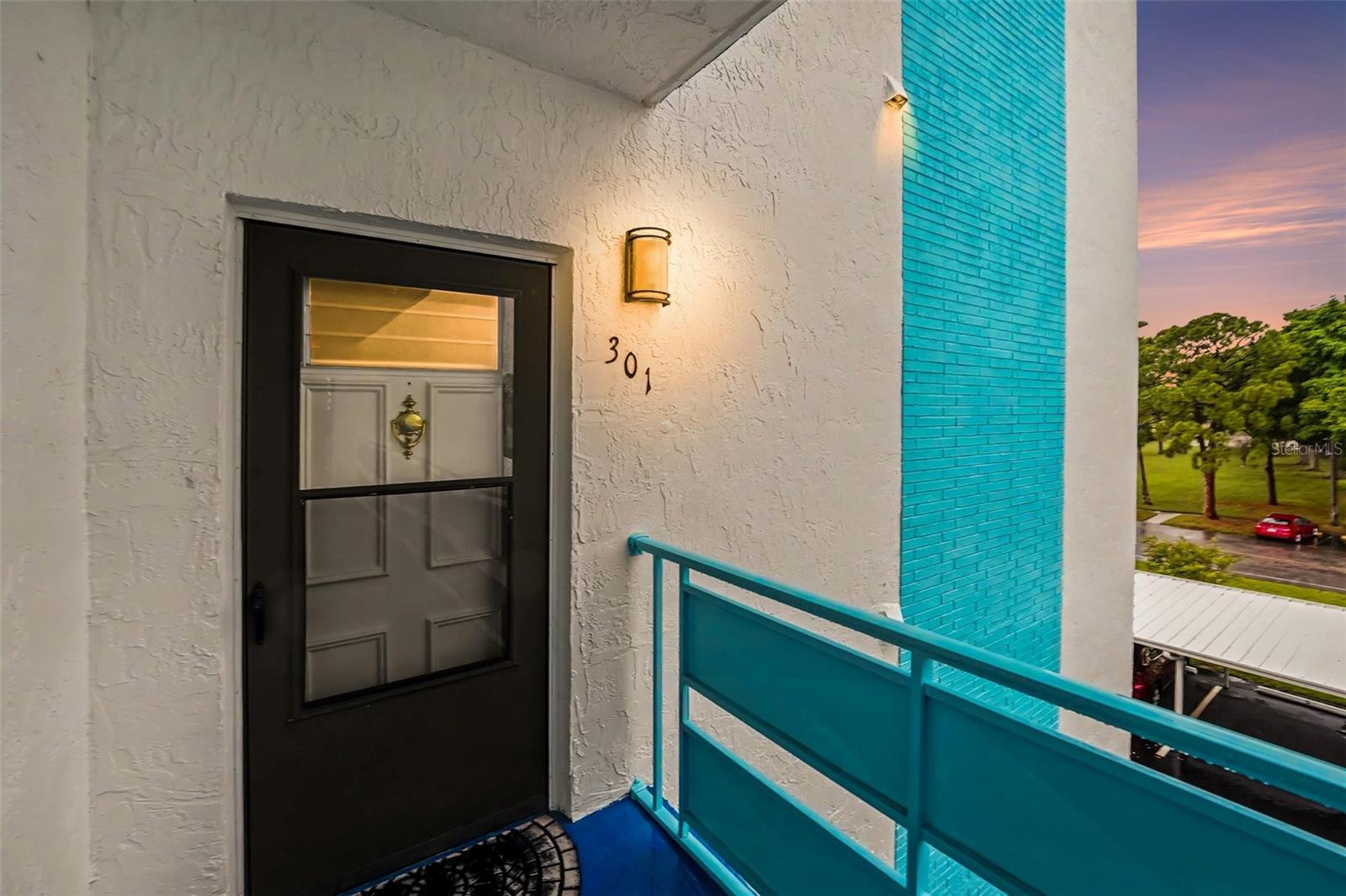 Located in the desirable Lexington Building within the sought-after 55+ community of Terrace Park at Five Towns, this beautifully maintained corner condominium offers comfort, convenience, and peaceful pond views with a picturesque fountain that creates the perfect backdrop for relaxing evenings.

Designed with both functionality and style in mind, this two-bedroom, two-bath residence features an open living and dining area that flows into a well-equipped kitchen complete with solid wood cabinetry, stone countertops, a pantry, white appliances, a gas range, and a built-in beverage refrigerator. Just off the main living space, the Florida room provides a bright retreat, while an additional flex room is ideal as a home office, breakfast nook, hobby room, or reading space.

The spacious primary and guest bedrooms each include walk-in closets, and two additional hallway closets provide ample linen and storage space. A FULL-SIZE IN-UNIT WASHER & DRYER provides the convenience of doing laundry from the comfort of your own home—an increasingly desirable feature that sets this condo apart. For added indoor comfort, the HVAC system is equipped with an APCO air purification system featuring germicidal UV light and activated carbon technology designed to help reduce airborne odors, mold, germs, and chemical vapors.

A dedicated covered carport adds everyday convenience, and the monthly HOA fee of $804.24 covers nearly all utilities, with electricity being the only separate expense.

Residents of Terrace Park at Five Towns enjoy an exceptional array of resort-style amenities, including six swimming pools, a spa, two fitness centers, tennis and bocce courts, billiards, card rooms, clubhouses, an auditorium, grilling areas, and scenic gazebos. The community also offers a full calendar of social events and activities, making it easy to enjoy an active lifestyle and meet neighbors.

Ideally situated near shopping, grocery stores, restaurants, medical offices, and just a short 10-minute drive to Madeira Beach, this move-in-ready home combines a prime location with low-maintenance living. Whether you're looking for a seasonal getaway or a full-time residence, this inviting condo is ready to welcome you home.
