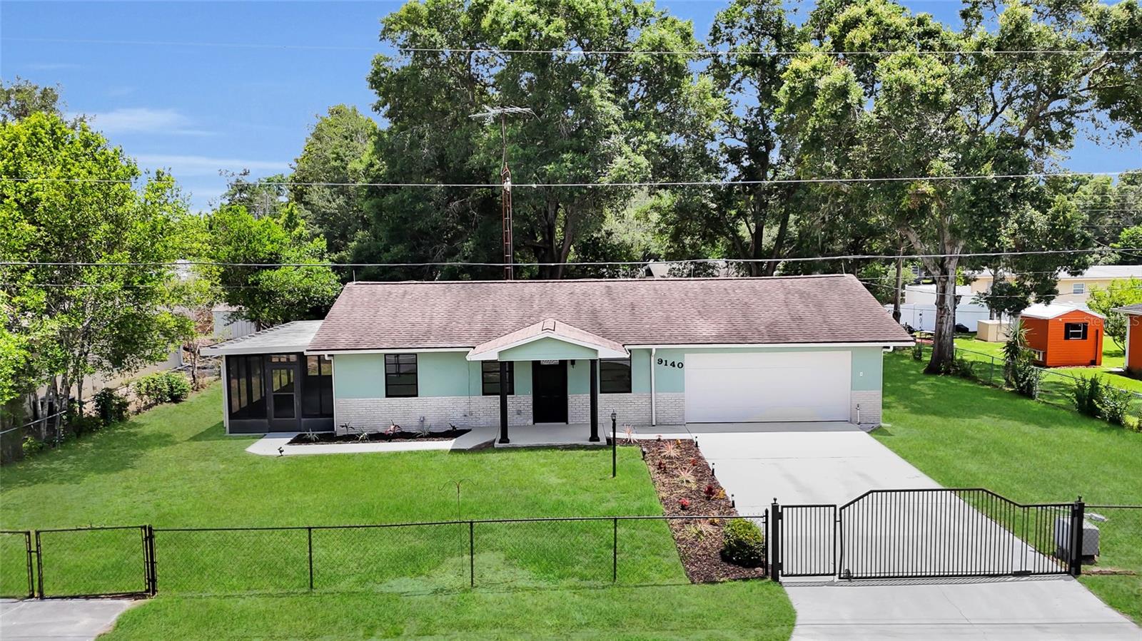 No HOA. No Deed Restrictions. No compromises. Welcome to this completely renovated, move-in ready home in the heart of Orange Blossom Hills, one of Marion County's most sought-after family-friendly neighborhoods.

Situated on an oversized .29-acre lot, this 3BR/2BA home offers the space and freedom you have been looking for. The seller spared no expense: enjoy a brand new kitchen, all new bathrooms, quartz countertops throughout, and a unique layout featuring TWO enclosed sunrooms for extra living and flex space. A large shed provides all the storage you could need, with no HOA telling you what to do with it.

Big-ticket items are already taken care of: roof 2021, AC 2020. Minutes from The Villages, shopping, dining, and schools, while still enjoying a quiet residential setting. Schedule your showing today before someone else calls it home.