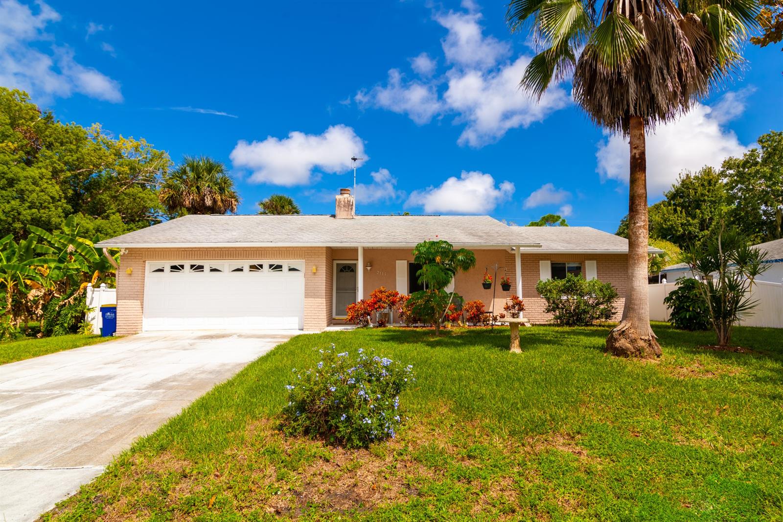 Welcome home to this well-maintained 3/2 family pool home in the Florida Shores community. Home is high and dry and there was no flooding from hurricane Ian. The home itself features a split bedroom floor plan with a large master bedroom, walk in closet and remodeled bathroom. A lovely stone fire place highlights the living room and dining room area with French doors leading out to the pool area. Stainless steel appliances in kitchen. Enjoy the gorgeous screened in pool area, perfect for entertaining friends and family. The yard is fully fenced and sits on a 80x125 size lot that includes a utility shed with electric.  Sizeable 2 car garage with washer and dryer. The home also features a water filtration system throughout the entire home. Centrally located near shopping, schools, I-95, parks and beaches. No HOA. 
All information to be verified by Buyer, measurements are approximate. ;Water: City
