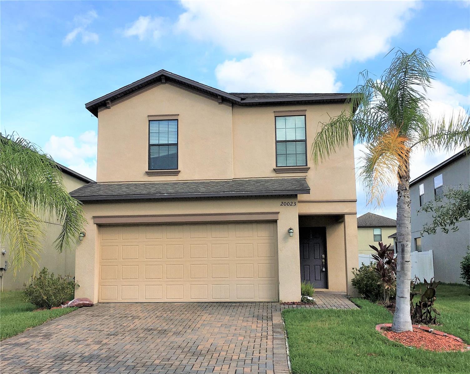 Discover your dream home in the heart of New Tampa's Live Oak Preserve community. This spacious 4-bedroom, 2.5-bathroom gem boasts a luxurious primary suite complete with a dual sink, garden tub, a stand-alone shower, and a walk-in closet. Upon entering you are greeted by tile flooring throughout the first floor, adding an elegant touch to your living space. The home features all bedrooms upstairs, ensuring privacy and tranquility. With a 2-car garage and washer/dryer included, this residence offers both comfort and practicality. Enjoy the vibrant community of Live Oak Preserve, spanning 1300 acres across New Tampa, with 362 acres of pristine wetlands. Indulge in the resort-style pool, splash zone, fitness center, and multiple tennis courts. Let your children play freely in the well-equipped playground and take leisurely strolls along the community's scenic walking trails. Nestled conveniently near hospitals, excellent schools, shopping malls, and major highways, this home combines luxury and convenience seamlessly. In addition to the advertised base rent, all residents are enrolled in the Resident Benefits Package (RBP) for $50.00/month which includes HVAC air filter delivery, credit building to help boost your credit score with timely rent payments, utility concierge service making utility connection a breeze during your move-in, and much more! More details upon application. Vacant/Available 12/06/2023
