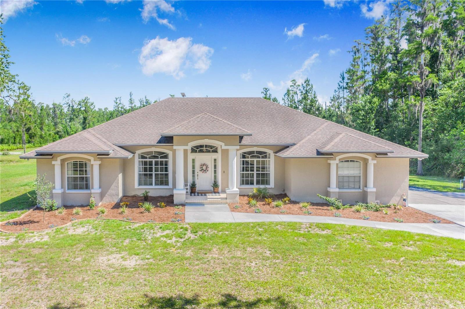 Home sweet home! You are ready to call this beautiful four-bedroom, one office, and three-bathroom home, sitting on 4.60 acres. Welcome to the best way to live in Polk County, Florida. There is no HOA or CDD; more than enough room to build an in-ground pool, and or bring your animals and add a barn. The sky is really the limit with this hidden gem!  This property comes with a built-in generator fueled by an in-ground propane tank, so there is no need to fear; you will always have power here. Time to ditch your water bill; a newly added 2024 water well. Home is well-maintained with quarterly pest control services. The in-laws are more than welcome in this home with an additional private room and bathroom for them to stay as long as they would like. Working from home has never been easier or more relaxing in this home office, which offers a view of the beautifully manicured front yard. Roasting marshmallows in the fire pit is a must-try. The time to purchase your dream home is right here; don’t miss out!