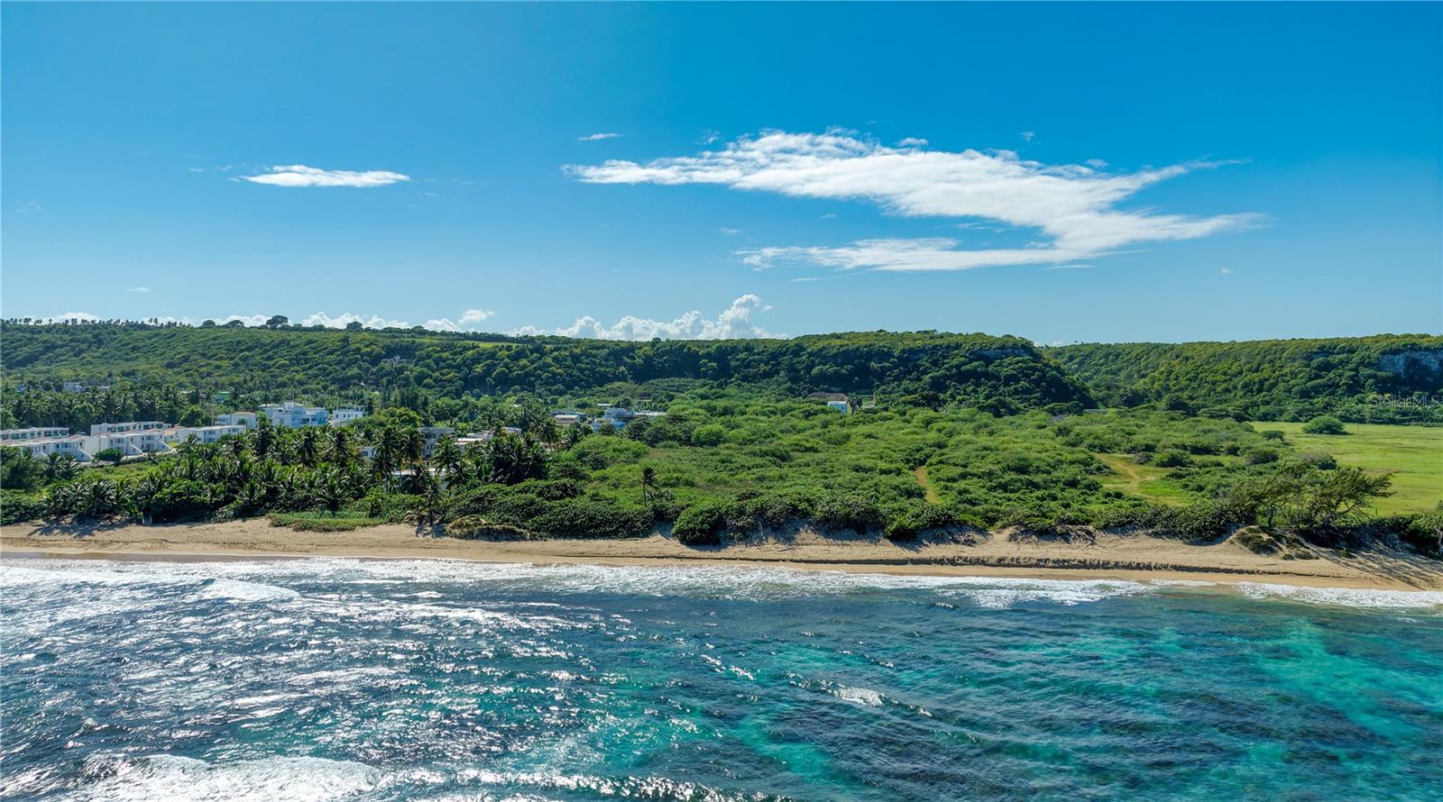 Ready for your unique vision, this expansive acreage in Isabela is a desirable offering with immeasurable potential. A rare to market parcel with APE-ZC zoning highlighted by breathtaking views of the ocean, creating the perfect backdrop for a variety of residential or hospitality projects. Affording a prime location for countless development opportunities, the property offers 6.8 acres of highly-coveted beachfront land. Located within close proximity to the Rafael Hernandez International Airport and the renowned Jobos Beach, providing a vibrant coastal lifestyle with immediate access to a variety of water sports. Isabela is situated within Puerto Rico's west coast, known for its world-class surfing and some of the island’s most stunning sunset vistas. * Images 2 through 6 are outlined approximations of the property.