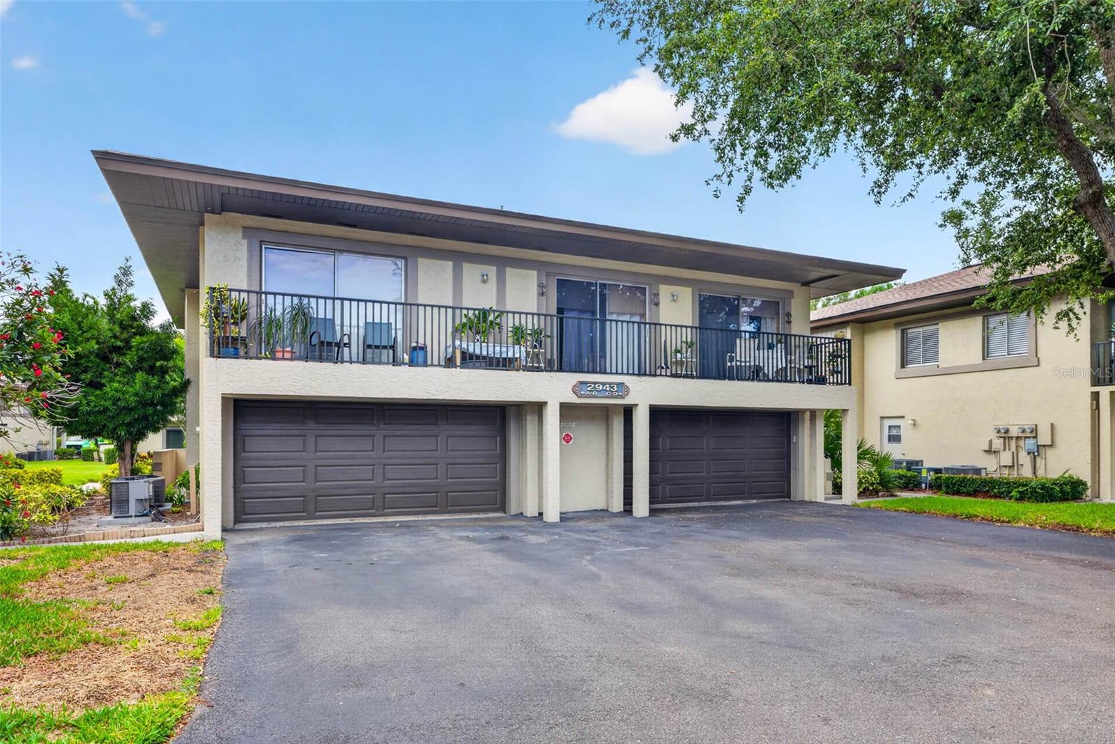 Welcome home to this beautifully updated 2-bedroom, 1.5-bath townhome offering comfort, convenience, and an unbeatable lifestyle with one of the lowest HOA fees in the community. As you step inside, you'll immediately appreciate the bright and inviting living space, designed for easy everyday living and entertaining alike. The kitchen is equipped with stainless steel appliances, providing a modern touch. A convenient half bath is located downstairs for guests, while upstairs you'll find two spacious bedrooms and a full bathroom designed for privacy and relaxation. Recent improvements provide added peace of mind, including UPGRADED ELECTRICAL (2022), all-new stainless steel kitchen appliances, and a new washer and dryer. An attached PRIVATE garage offers additional storage and convenience, making daily life even easier. Step outside and discover why residents love this community. The AFFORDABLE HOA fee covers access to an impressive collection of amenities, including a sparkling community POOL, tennis courts, a COMMUNITY DOCK, private fishing pier, and scenic walking trail along the water. Whether you enjoy morning walks, fishing at sunset, or spending weekends by the pool, there's something here for everyone. Eastwood Shores is ideally situated near St. Pete–Clearwater International Airport, U.S. 19, and the Bayside Bridge, providing easy access to Tampa, St. Pete, and the surrounding beaches. With no age restrictions and exceptional amenities included at an affordable monthly cost, this move-in-ready home offers the perfect combination of value, lifestyle, and convenience.