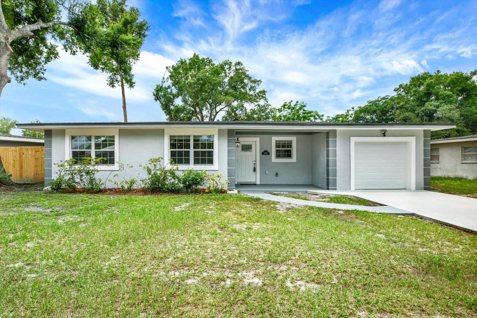 Under contract-accepting backup offers. Freshly renovated and completely move-in ready, this beautifully refreshed 3-bedroom, 2-bath residence with a 1-car garage delivers comfort, functionality, and modern style in a convenient Tampa setting. From arrival, the inviting curb appeal and clean updates create an immediate sense of warmth and care.

Inside, natural light fills the thoughtfully redesigned interior, creating an airy atmosphere throughout. Contemporary finishes, refreshed surfaces, and stylish details bring a polished look to every space. The flowing layout creates an easy connection between gathering areas, making everyday living feel comfortable and effortless.

Out back, an oversized yard provides endless possibilities for entertaining, gardening, outdoor fun, storage, recreational vehicles, or creating a private Florida retreat. Whether enjoying quiet evenings outdoors or hosting weekend gatherings, this spacious exterior gives flexibility rarely found at this price point.

The garage adds practical storage and convenience, while the location places you near shopping, dining, parks, major roadways, and local attractions throughout Tampa Bay.