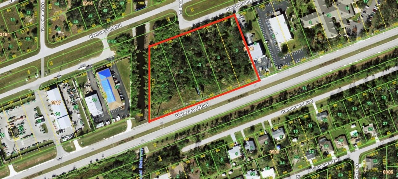 **AMAZING 4.15 ACRES COMMERCIAL PROPERTIES** TO BE SOLD TOGETHER** PID: 402204329001, 402204329002, 402204329003, 402204329004. With rear ingress and egress via Kenilworth Blvd leading to the signalized intersection of Cochran Blvd, it is centrally positioned in the thriving Murdock Retail and Business District. Adjacent to the property, you will find prominent establishments such as Publix, Walgreens, Home Depot, Super K, Kohl's, and Best Buy. Just half a mile to the west, major retailers like Target and Walmart Supercenter are situated. Conveniently, I-75 is just a 5-minute drive east on Veterans Blvd, where a selection of hotels and grocery stores are located. Invest today in the fastest growing area in the country!