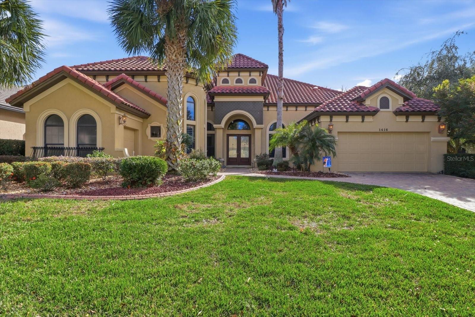 Show-stopping residence located in Terra Vista within the highly sought-after Bellamy Ridge community. This original model home is the definition of elegance and space. Offering over 4,000 square feet of living space, this expansive home features 4 bedrooms and 3.5 bathrooms, designed to impress at every turn.

The heart of the home showcases a sleek eat-in kitchen with quartz countertops, gas stove, double ovens, and abundant cabinetry, all overlooking the main living area with a cozy fireplace, perfect for entertaining or everyday comfort. A separate formal dining area adds flexibility for hosting special gatherings.

The primary suite is truly impressive, featuring tray ceilings and a private sitting area flooded with natural light. The luxurious primary bathroom offers double sinks, a walk-in shower, generous storage, and the added convenience of a private washer and dryer that convey with the home.

Downstairs includes three additional rooms, one currently used as an office, offering versatility for guests, hobbies, or work-from home needs.

Upstairs, you’ll find an impressive 845-square-foot loft complete with a full bathroom and kitchenette, ideal for a guest suite, in-law quarters, home theater, game room, private gym, or extra living space.

Step outside to your personal retreat: a stunning covered lanai with travertine pavers, custom outdoor kitchen perfect for BBQs and family gatherings, and a resort-style pool and spa designed for pure relaxation.

Community amenities include indoor and outdoor pools, tennis courts, golf and a golf simulator, library, billiards room, on-site restaurants, and a full-service spa.

Additional highlights include a two-car garage plus an attached golf cart garage, completing this exceptional home that blends luxury, comfort, and functionality. Call today for a private showing, where elegance welcomes you home at every corner.