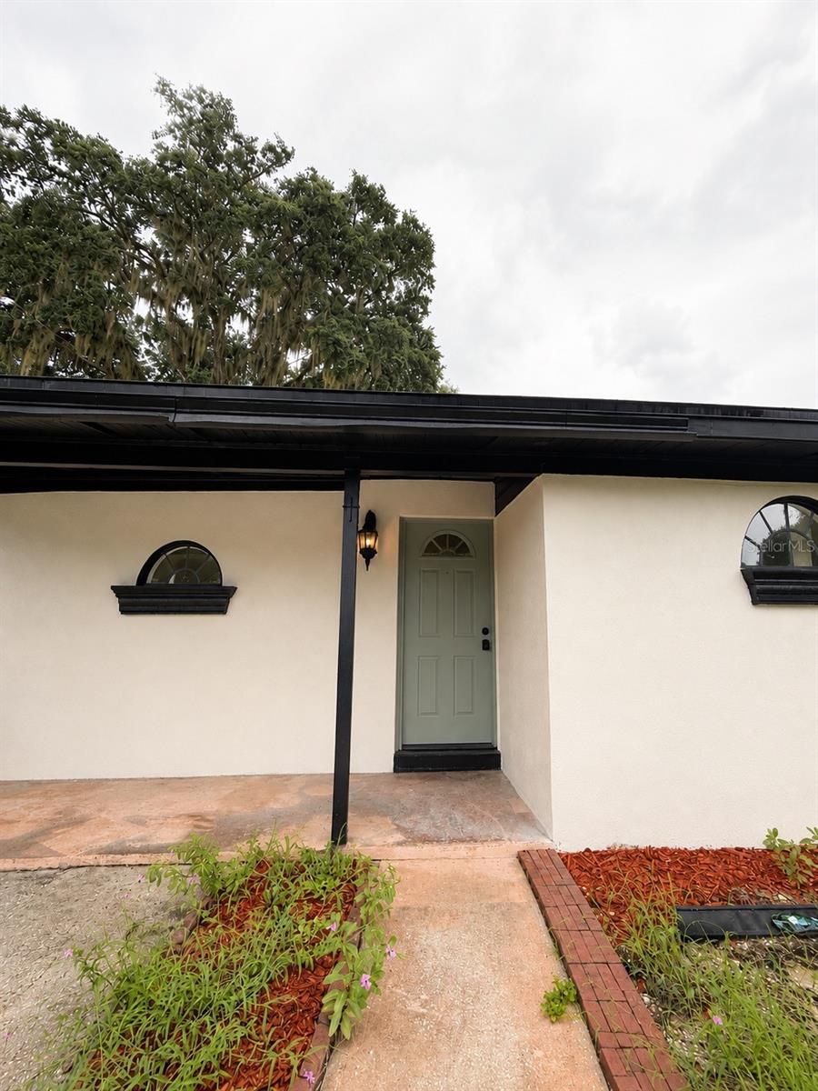 Beautifully renovated 4-bedroom, 2-bath home featuring a modern kitchen with stainless steel appliances, updated bathrooms, and luxury vinyl flooring throughout. Spacious layout with plenty of natural light and a large fenced backyard, perfect for outdoor enjoyment. Conveniently located near shopping, dining, schools, major highways, and Orlando Sanford International Airport. Move-in ready—schedule your showing today!
