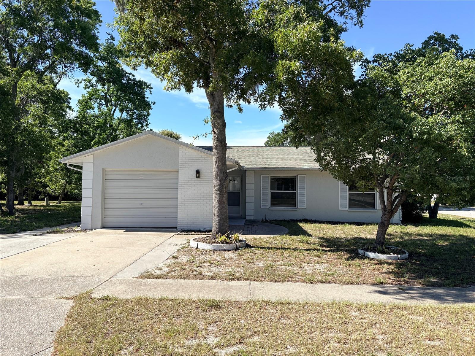 Charming 3BR/2BA home offering 1,051 sq. ft. of comfortable living space on a desirable corner lot in the family-friendly Beacon Woods East community. Mature shade trees provide curb appeal and a welcoming outdoor setting, while the spacious one-car attached garage offers plenty of storage and convenience.
Residents enjoy access to community amenities through a modest HOA fee of just $100 per quarter, including a swimming pool, clubhouse, tennis courts, park, and playground.
Additional features include:
• No Flood Zone
• Roof approximately 12 years old
• A/C approximately 7 years old
• Corner lot location
• Convenient access to major roadways, shopping, dining, and everyday conveniences
This well-maintained home is an excellent opportunity for first-time buyers, downsizers, or investors seeking value in a desirable neighborhood.wawa