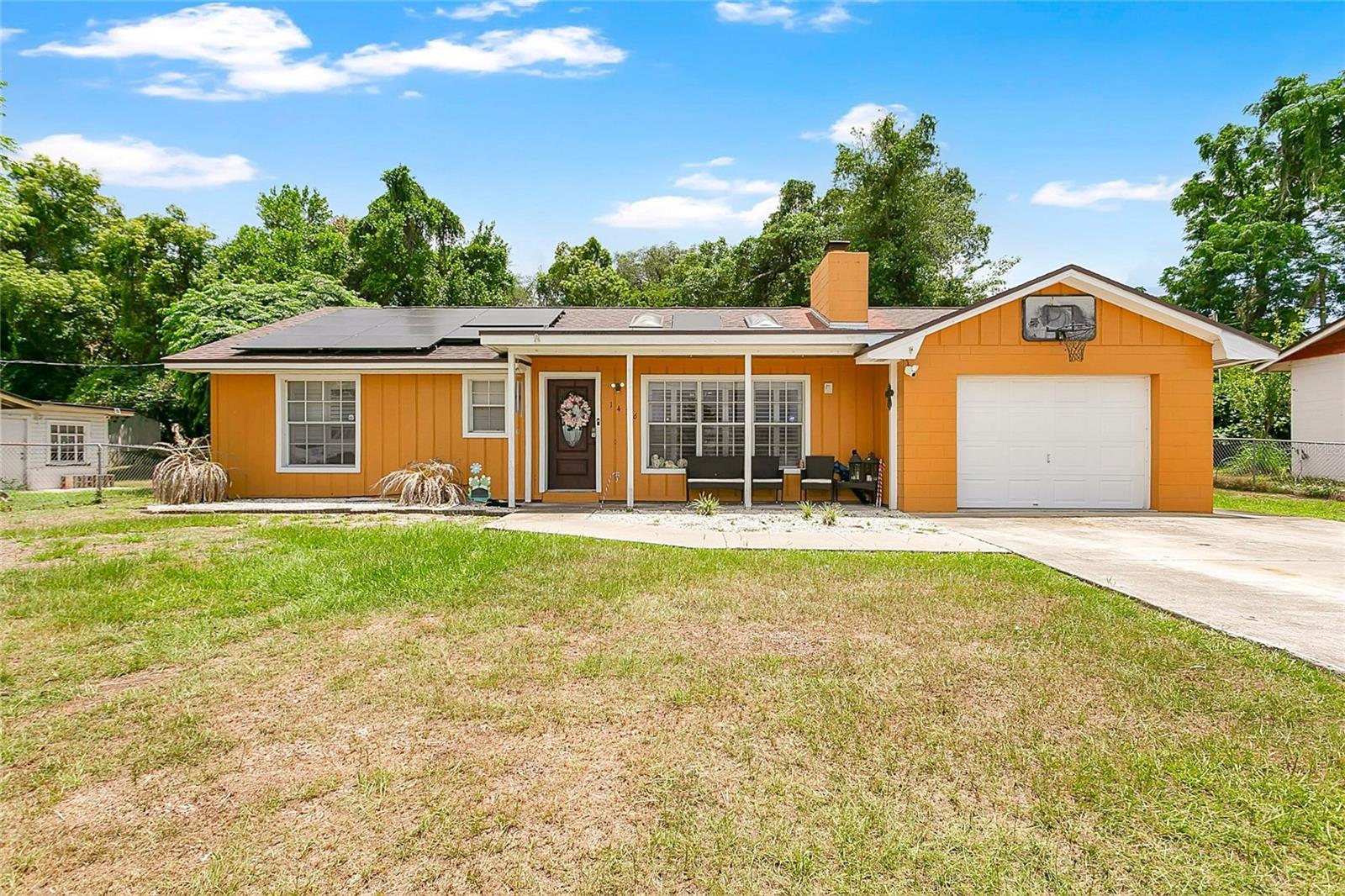 ****** PRIVATE POOL | NO HOA | 3 BEDROOMS + FLEX SPACE | VAULTED CEILINGS | BRICK FIREPLACE | OVERSIZED GARAGE ***** Welcome to this bright and inviting home featuring 3 bedrooms, 2 bathrooms, a private office/den, and a beautiful screened pool perfect for enjoying the Florida lifestyle year-round. As you enter, you'll love the open-concept layout, soaring vaulted ceilings, and skylights that fill the home with natural light. The spacious family room showcases a stunning brick fireplace and flows seamlessly into the kitchen, complete with an island, ample counter space, and plenty of storage—ideal for everyday living and entertaining. The home also offers a flexible bonus space near the kitchen that can be used as a home office, hobby room, or additional storage. Ceramic tile flooring runs throughout the main living areas for easy maintenance.

Step outside to your fully fenced backyard oasis featuring a sparkling private pool, perfect for relaxing or hosting family and friends.

Schedule your private showing today!