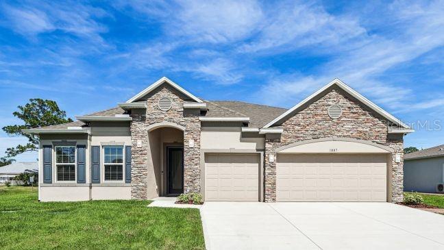 Pre-Construction. To be built. Introducing Stillwater Cove, a new lakefront community in Astatula, Florida. Featuring ½ acre homesites, sidewalk lined streets, and included 3 car garages, this beautiful neighborhood provides a rare opportunity to live just 1 minute from the Astatula Boat Ramp on Little Lake Harris and only 45 minutes from downtown Orlando.

Luxury meets comfort in The Venice floor plan. This thoughtfully designed one story home on a corner lot combines upscale finishes, an open layout, and beautiful surroundings to create an exceptional living experience. Inside, 10' ceilings enhance the spacious feel, while ceramic tile flooring throughout creates a seamless, cohesive flow.

The split bedroom layout includes a private guest ensuite with a full bath & walk-in closet, providing added privacy for multigenerational living or overnight visitors. The primary suite serves as a relaxing retreat, featuring a deluxe bath with dual quartz vanities, an oversized tiled shower, separate pedestal tub, and a large walk in closet that blends elegance with everyday comfort. Two additional secondary bedrooms are situated on the opposite side of the home and share a full bath with a tub and tile shower combination.

At the center of the home, the gourmet kitchen showcases quartz countertops throughout, upgraded soft-close cabinetry, a stylish backsplash, a spacious walk in pantry, and a full line of stainless steel appliances, including a double wall oven, cooktop, and side by side refrigerator. The kitchen flows effortlessly into the spacious great room with soaring 11' ceilings, where abundant natural light creates an inviting setting for everyday living and entertaining. Just off the great room, the private den features a French door leading to the covered lanai along with a French door with sidelights at the entry, creating a versatile space for a home office, reading room, or lounge.

Step outside to the covered lanai overlooking your expansive homesite with lush landscaping, creating a peaceful place to unwind. Additional highlights include a laundry room with upper cabinets, crown molding, driveway and entry pavers, architectural shingles, and a spacious 3 car garage with ample room for vehicles, storage, or a workshop.

Complete with Smart Home features, including a Ring Doorbell, and backed by the peace of mind of a full builder warranty, The Venice delivers modern comfort and lasting quality. Situated on a spacious half acre homesite in Stillwater Cove, this home also allows boat parking in your driveway and places you within a lakefront community with access to the Little Lake Harris boat ramp, bringing together space, convenience, and exceptional value.