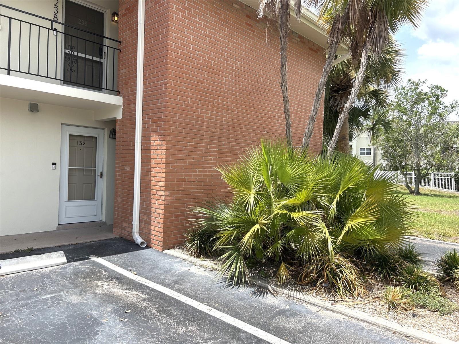 All newly renovated due to hurricane/flooding. The Association is well insured. All new inside, including a/c compressor outside. Bike storage enclosure adjacent. Back door opens to green space. Nice layout with good sized bedrooms. Efficient galley kitchen w/pantry closet opposite fridge. New appliances. Primary bedroom has large walk-in closet 5"7" x 8' and space-saving pocket door. Bedroom 2 has wall-to-wall closet. Front hall closet provides more storage space. Living room dining area combo total 13x28. Florida room/sunroom perfect spot to while away the day with a good book, or use for computer niche, TV area, or playroom. Designated parking spot #132 to left of front door. Clubhouse w/ laundry facility just steps away across the driveway and next to the clubhouse and lovely pool and patio.