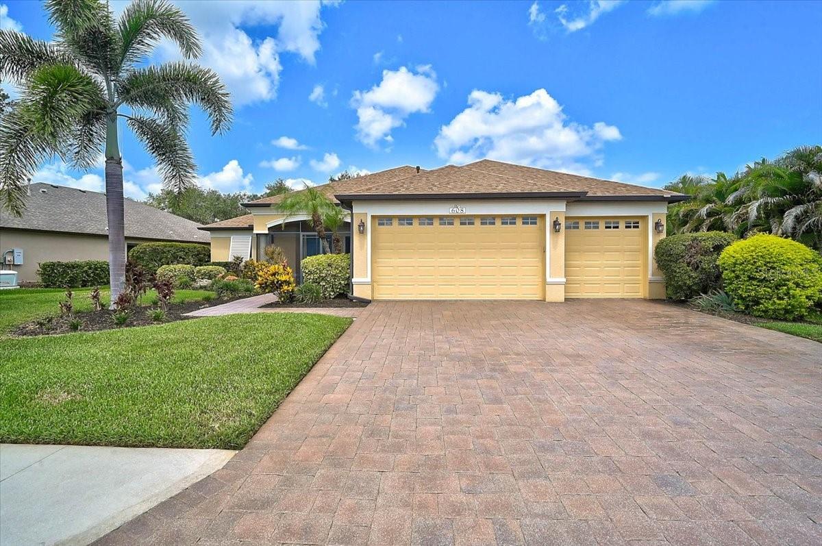 Virtually Staged. Tropical Oasis in Greyhawk Landing. Step into your own private Florida paradise at this beautifully appointed home in one of Bradenton’s most sought-after communities. Nestled in Greyhawk Landing, this 3-bedroom  2.5-bath residence with a versatile flex room (perfect for a home office, den, or guest suite), pool powder room, and oversized 3-car garage delivers exceptional quality and thoughtful designer details at every turn. The heart of the home is a true gourmet kitchen featuring stainless steel appliances, a generous island ideal for entertaining and casual gatherings, and a sunny breakfast nook. An expansive open-concept layout seamlessly connects living spaces to the breathtaking outdoor retreat — an oversized lanai area complete with heated saltwater pool and above-ground hot tub, all framed by lush conservation views that deliver that coveted tropical Florida escape right in your backyard. Additional highlights include: • Electric hurricane screens and built-in window screens for effortless peace of mind (2023)• Brand-new roof (2025)• Newer A/C system (2024) - 2 Custom Closets in primary suite. Plantation Shutters throughout the home.
Resort-Style Living at Greyhawk Landing: This exceptional community is renowned for its natural beauty and world-class amenities. Residents enjoy two community centers, multiple pools and spas, a fitness center, playgrounds, tennis and pickleball courts, walking/biking trails, sports fields, and serene fishing areas — all within a secure, 24-hour guarded gate environment. With low annual HOA fees, reclaimed irrigation, and natural gas, everyday living is both luxurious and practical. Whether you’re hosting sunset gatherings by the pool, working from your flex space with nature as your backdrop, or taking advantage of endless community activities, this home offers the perfect blend of modern comfort, resort amenities, and authentic Florida charm.
Ready to experience this tropical gem? Schedule your private showing today — homes like this in Greyhawk Landing don’t last long!
Some rooms are virtually staged.