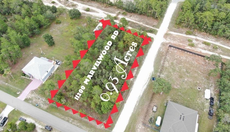 Really Big Royal Highlands corner lot for sale on a Paved Road. Only borders one neighbor. Front, Back, and on one side streets. Nestled in the heart of Hernando County, this expansive 0.93-acre vacant lot offers the perfect opportunity to build your dream home. NO Flood Insurance needed, NO HOA and no CDD. Buying this lot could save you time and money if you want to own your own home. Don't waste time and come to know this beautiful piece of land in a true natural paradise.Located just a short distance from the natural beauty of Weeki Wachee Springs,Pine Island Beach, Cortez Blvd(50), Restaurants, Walmart, Public, Commercial Way(US 19), SR 98 this property is a true gem for nature lovers and outdoor enthusiasts. Whether you envision a cozy retreat, a vacation getaway, or a full-time residence, this property provides the ideal canvas for your vision. Conveniently situated with easy access to local amenities, parks, and waterfront activities, you'll enjoy the best of both worlds—seclusion and proximity to all that the Gulf Coast has to notice